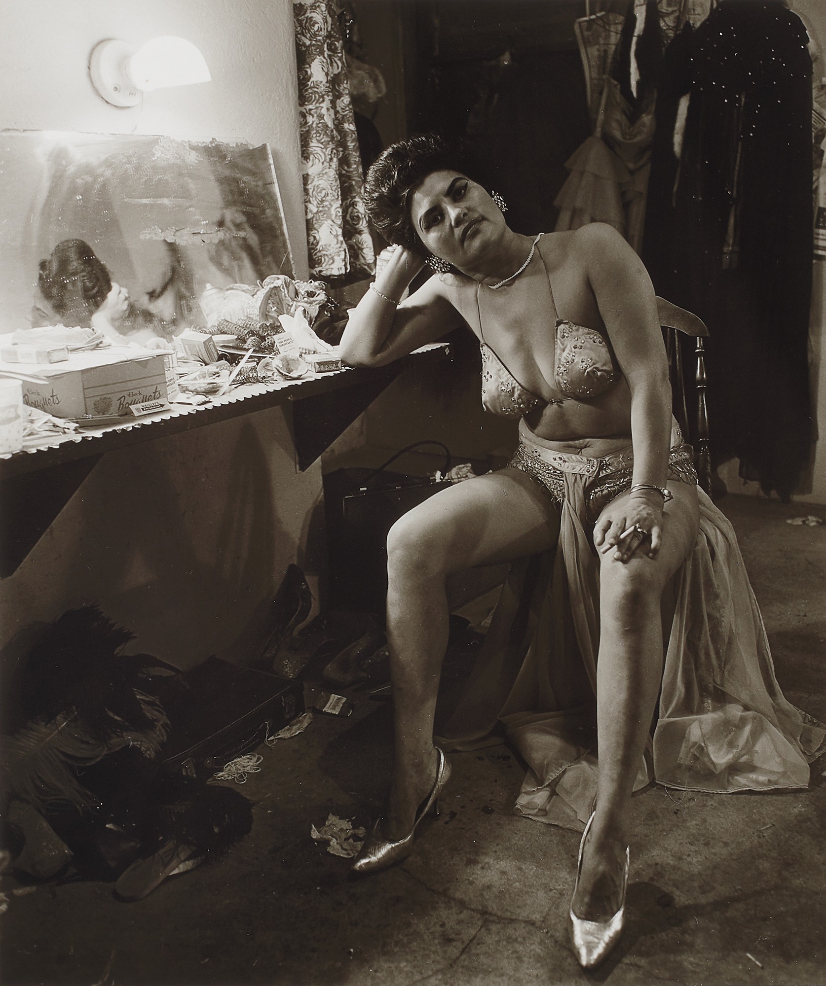 <p><strong>DIANE ARBUS</strong> <em>Peaches Palmer, Stripper in Dressing Room. Atlantic City, N.J.</em>, 1963</p>