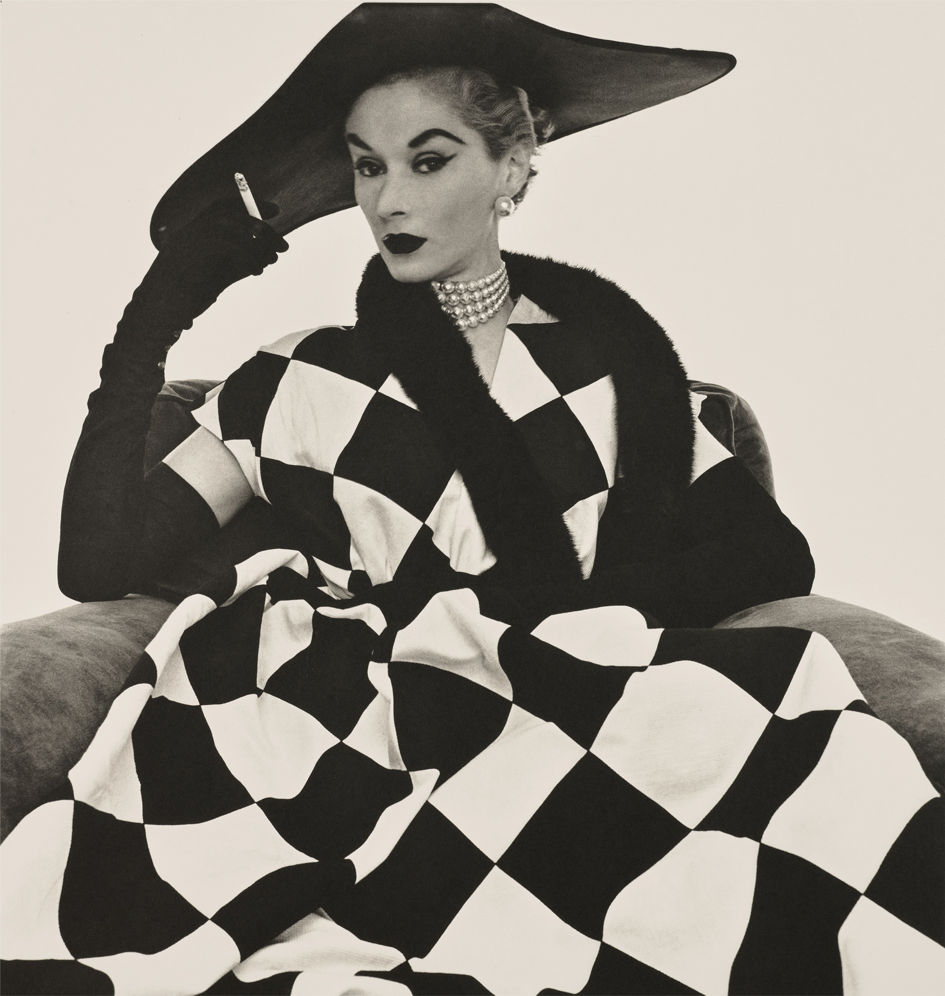 <p><strong>IRVING PENN</strong> <em>Harlequin Dress (Lisa Fonssagrives-Penn),</em> 1950</p>