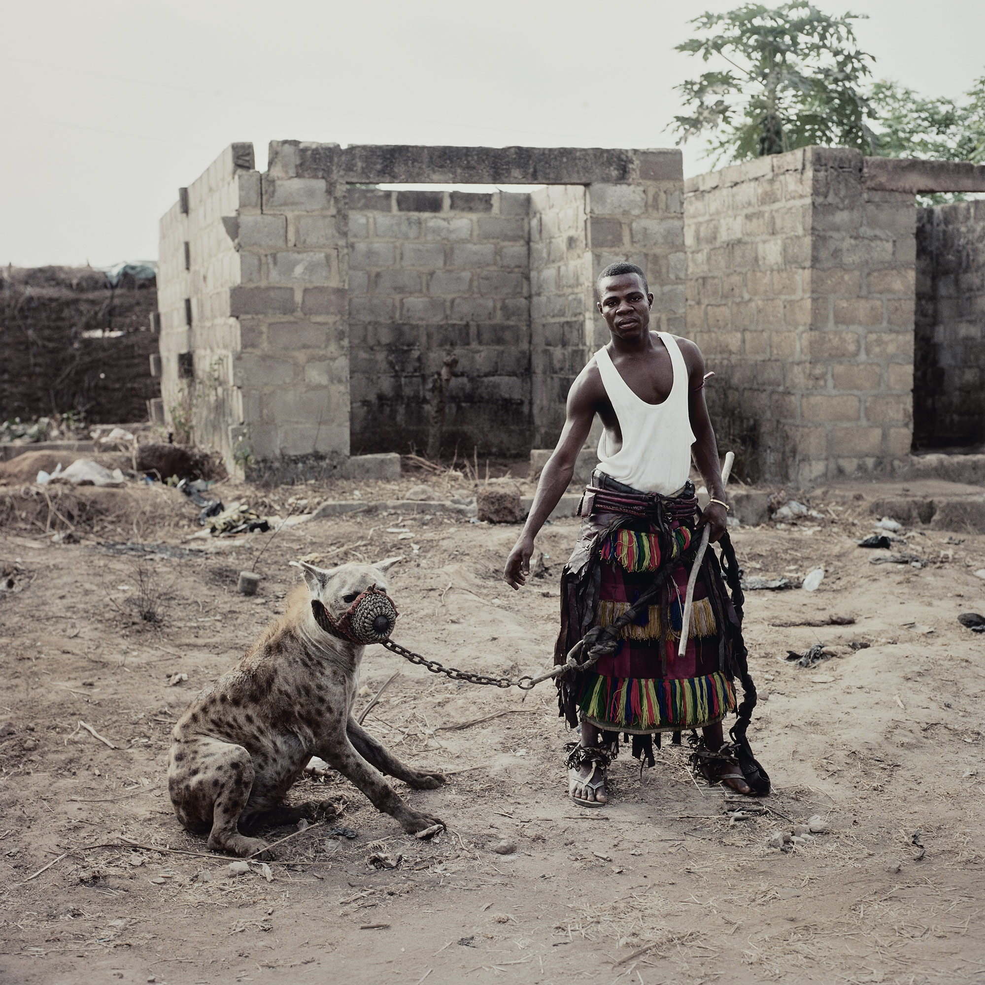<p><strong>PIETER HUGO </strong><em>Mohammed Rabiu with Jamis, Ibusa, Nigeria from The Hyena and Other Men</em>, 2007</p>
