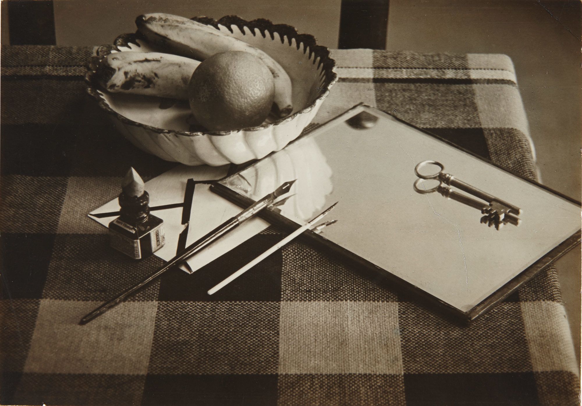 <b>ANDRÉ KERTÉSZ</b> <i>Still Life with Mirror, Pens and Key</i>, circa 1927