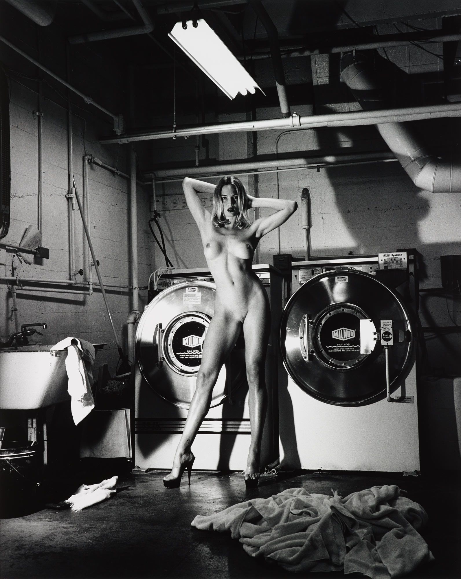 <b>HELMUT NEWTON</b> <i>Domestic Nude III, In the Laundry Room of the Château Marmont, Hollywood</i>, 1992