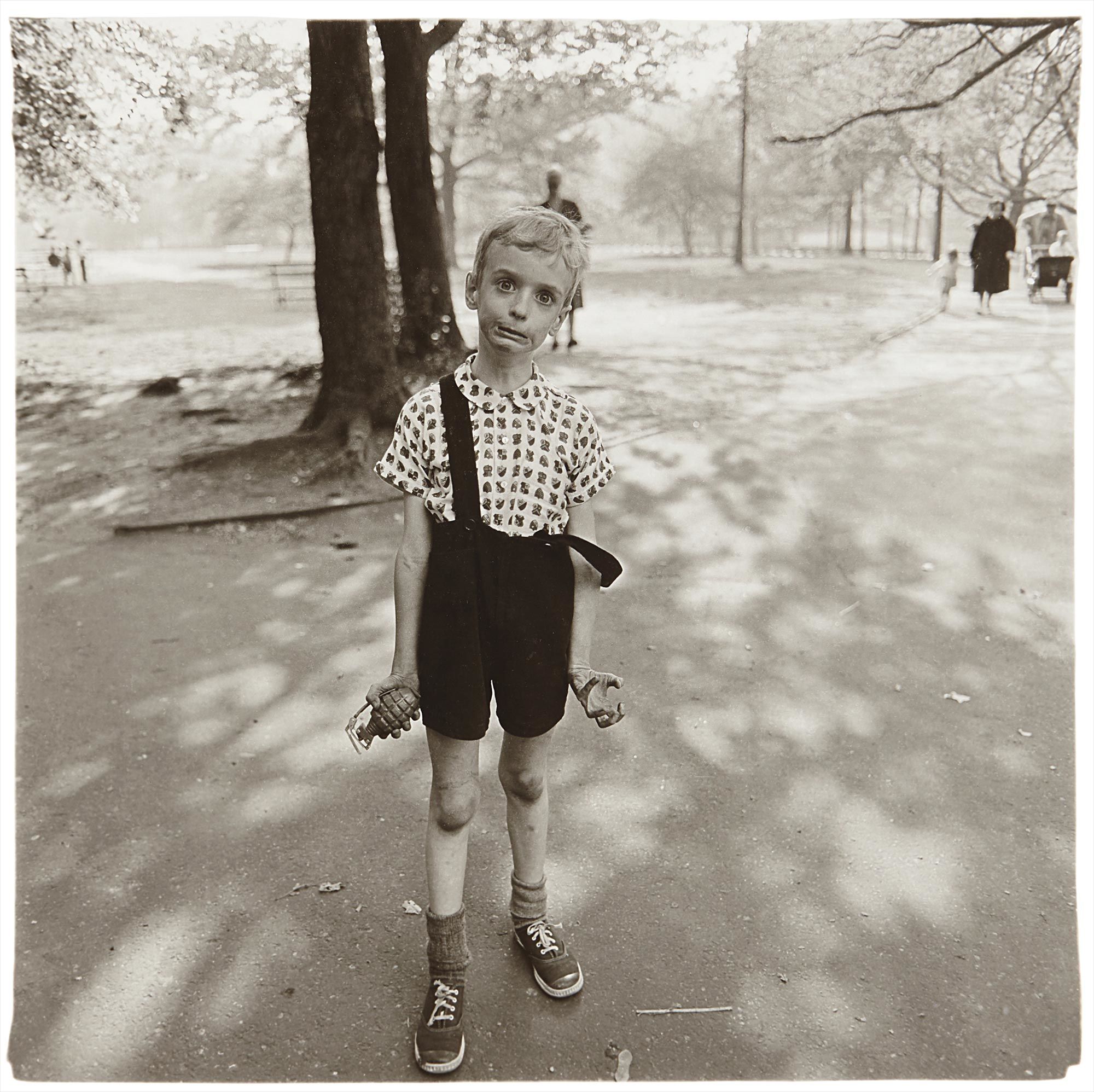 <b>DIANE ARBUS</b> <i>Child with a toy hand grenade in Central Park, N.Y.C.</i>, 1962