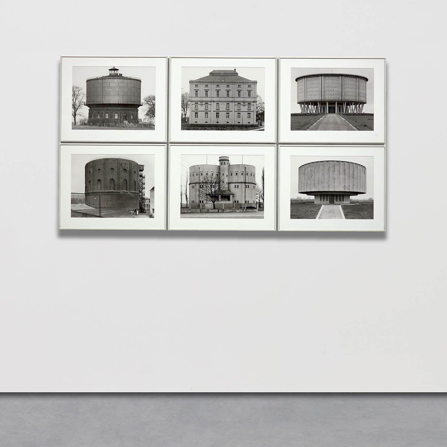 <p><strong>BERND AND HILLA BECHER&nbsp;</strong><em>Water Towers</em>, 1963-1980</p>
