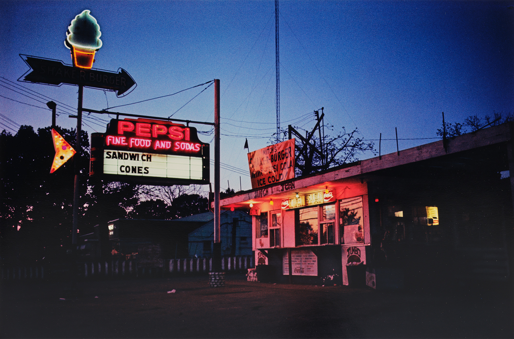 <p><strong>WILLIAM EGGLESTON </strong><em>Untitled (hamburger stand at night),</em> circa 1970-1974</p>