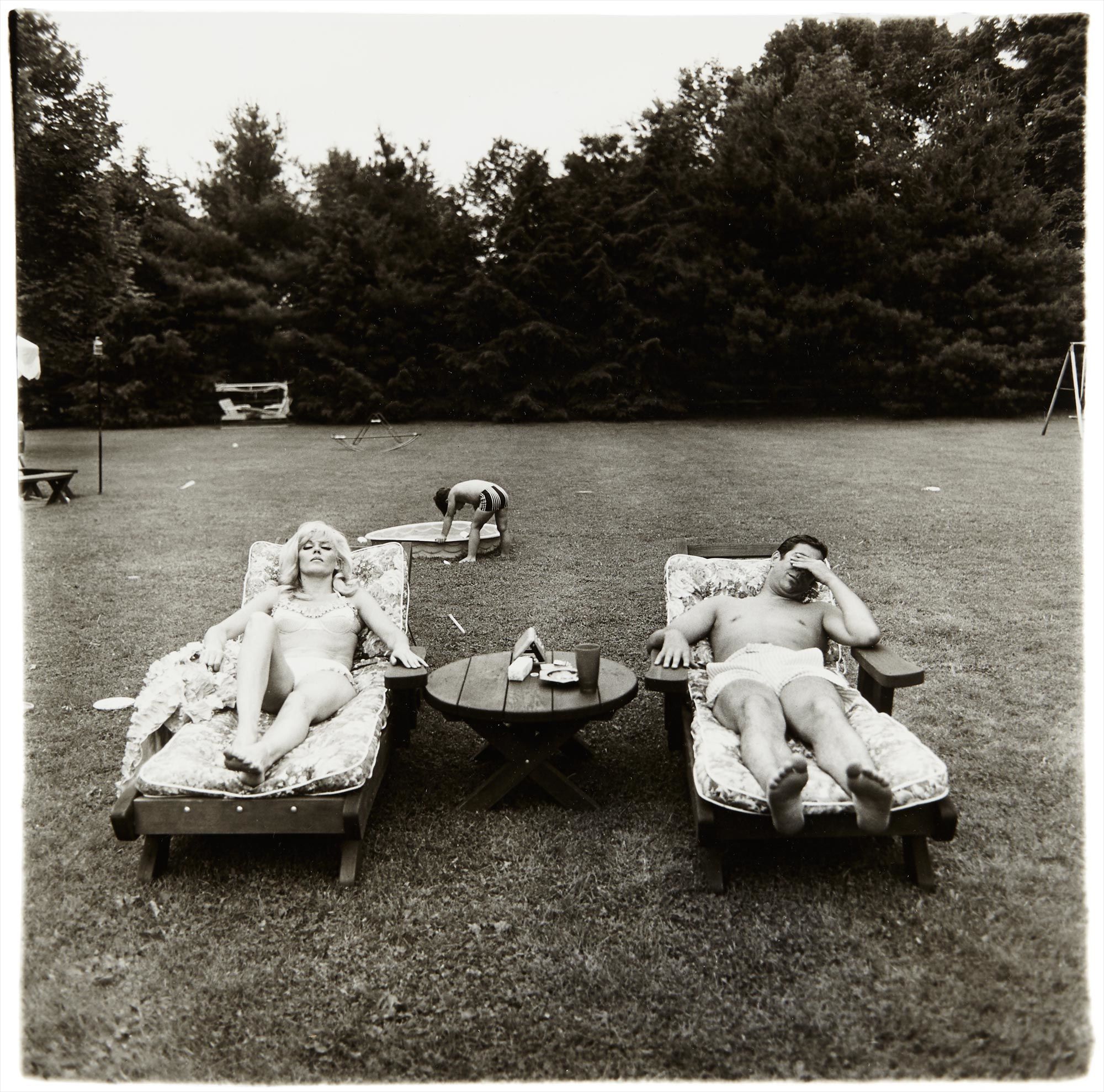 <b>DIANE ARBUS</b> <i>A Family on Their Lawn One Sunday in Westchester, N.Y.,</i> 1968