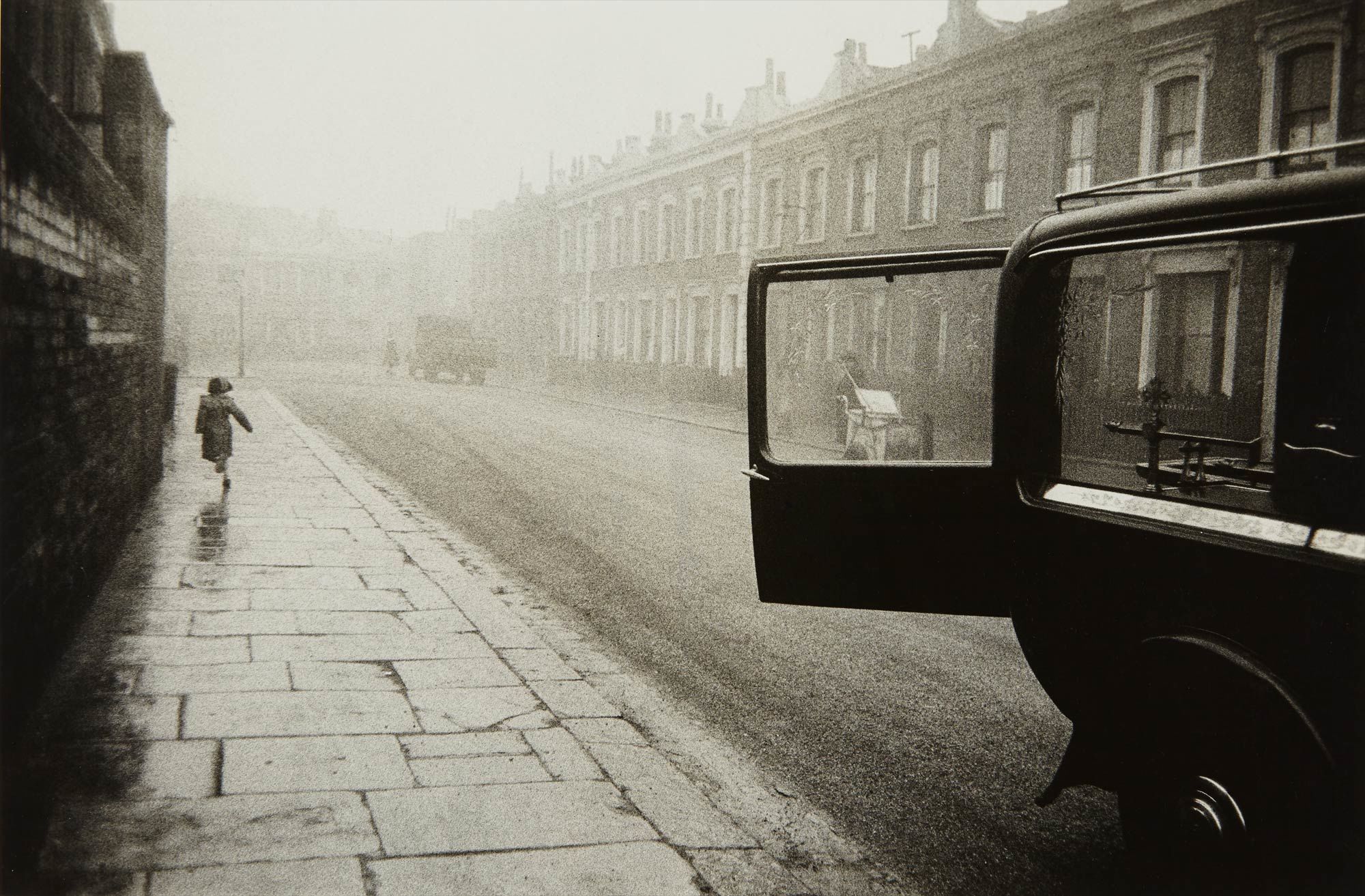 <b>ROBERT FRANK</b> <i>London (Hearse and Girl Running),</i> 1951