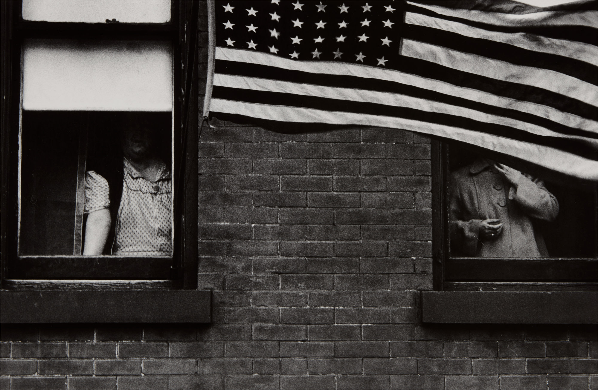 <p><strong>ROBERT FRANK</strong> <em>Parade - Hoboken, New Jersey</em>, 1955</p>