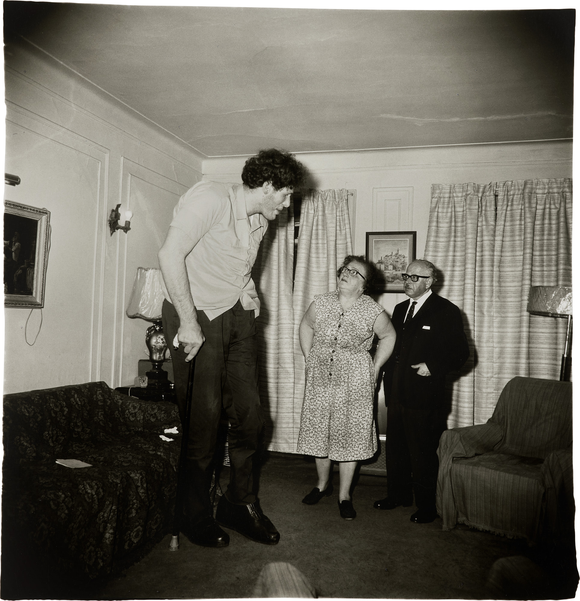 <p><strong>DIANE ARBUS</strong> <em>A Jewish giant at home with his parents in the Bronx, N.Y.,</em> 1970</p>