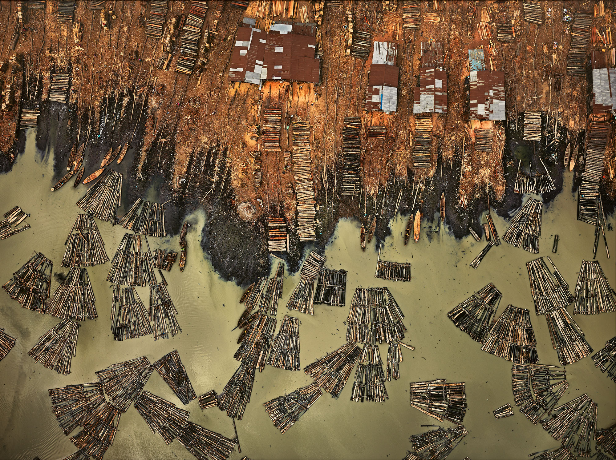 <p><strong>EDWARD BURTYNSKY </strong><em>Sawmills #1, Lagos, Nigeria,</em> 2016&nbsp;</p>
