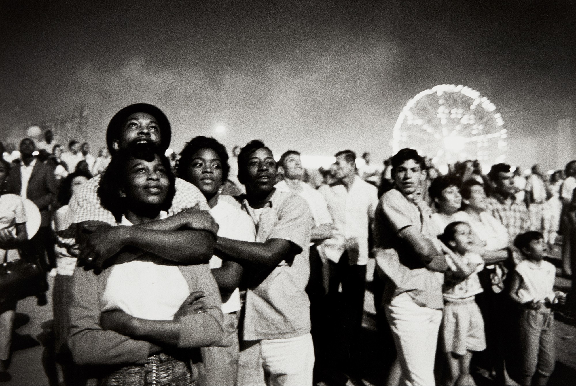 <p><strong>BRUCE DAVIDSON</strong> <em>July fireworks, Coney Island, New York</em>, 1962</p>