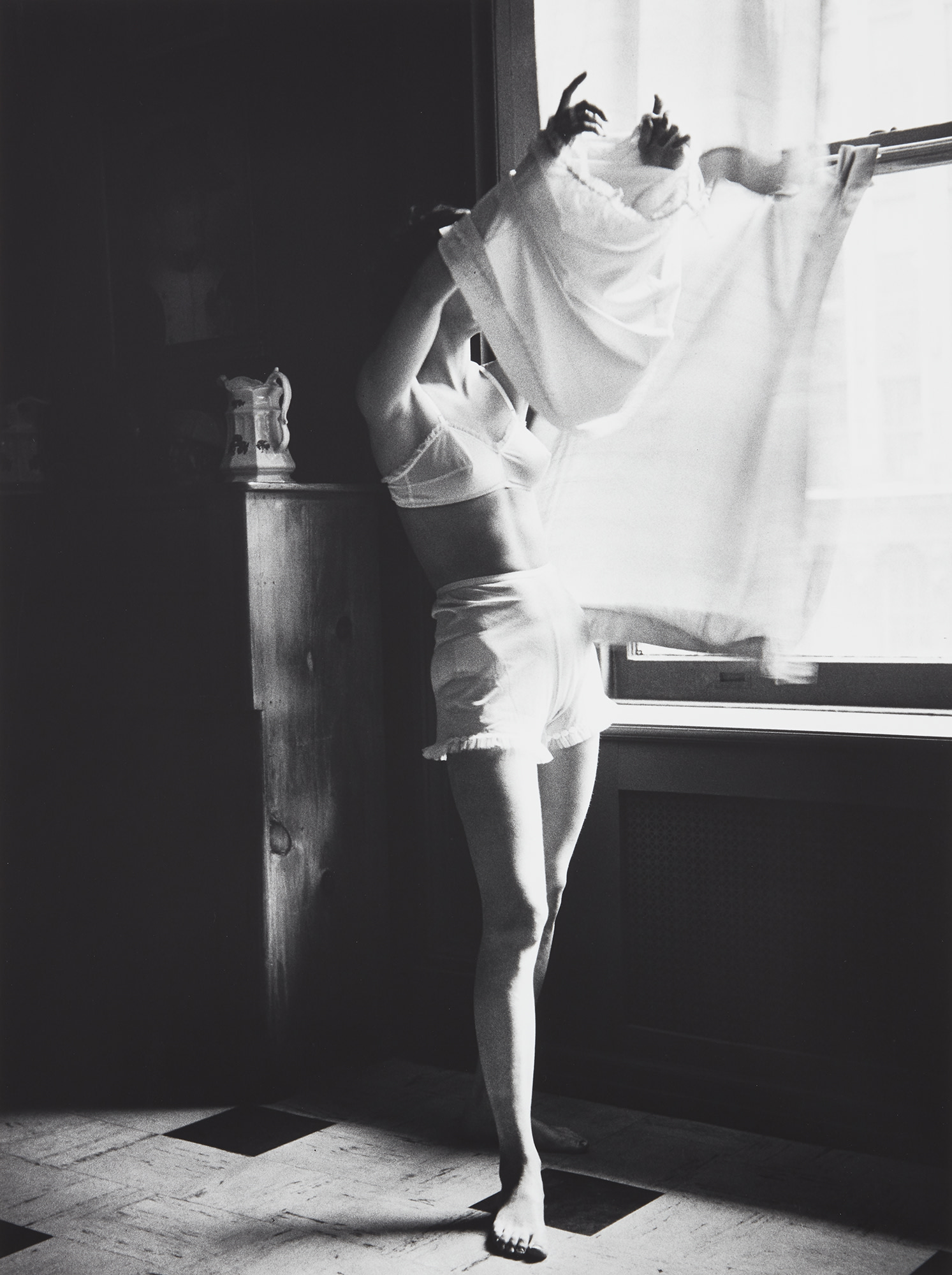 <p><strong>LILLIAN BASSMAN</strong> <em>Next to Nothing. Model Unknown, New York. Junior Bazaar</em>, 1948</p>