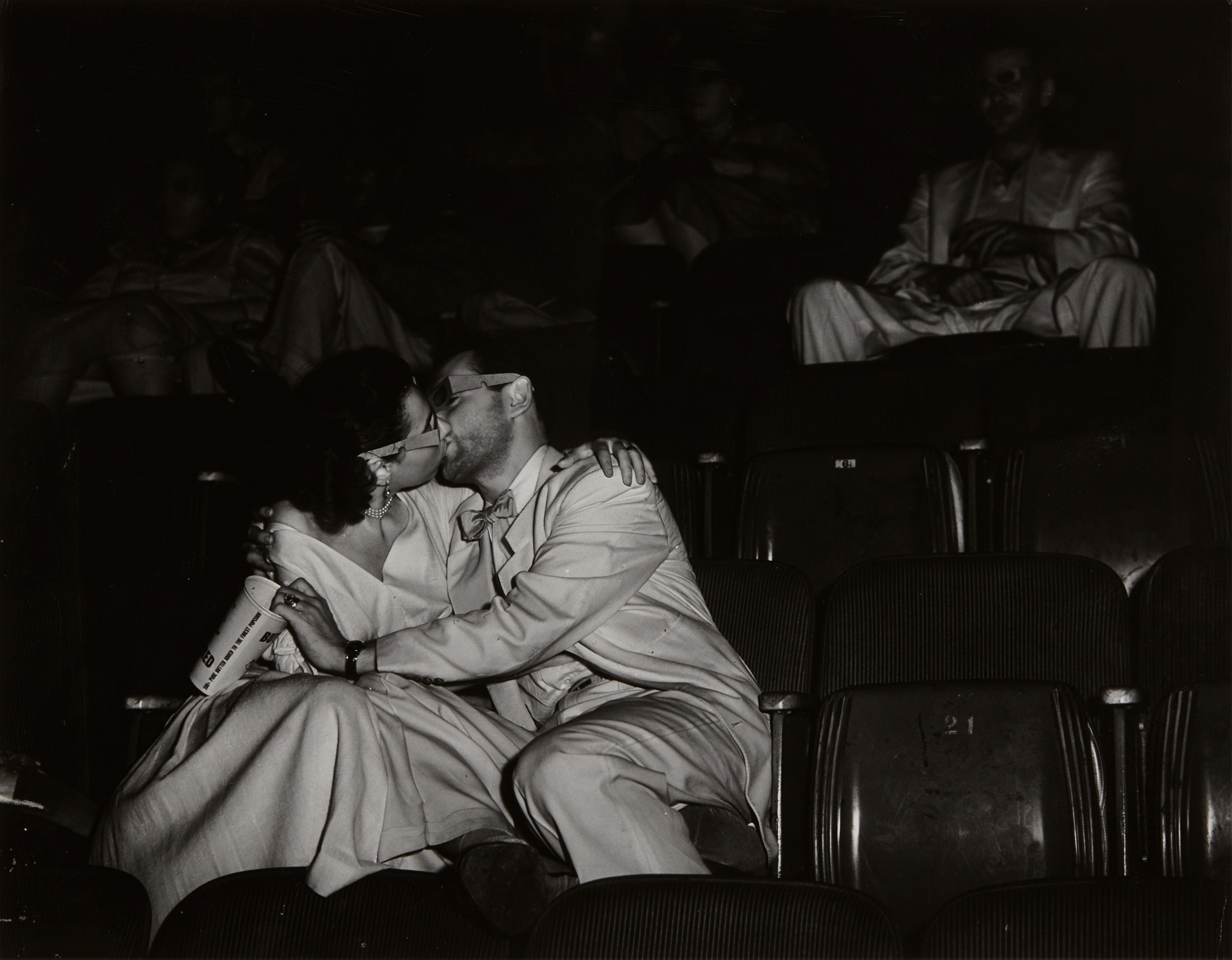 <p><strong>WEEGEE</strong> <em>Lovers at the Palace Theater,</em> circa 1945</p>