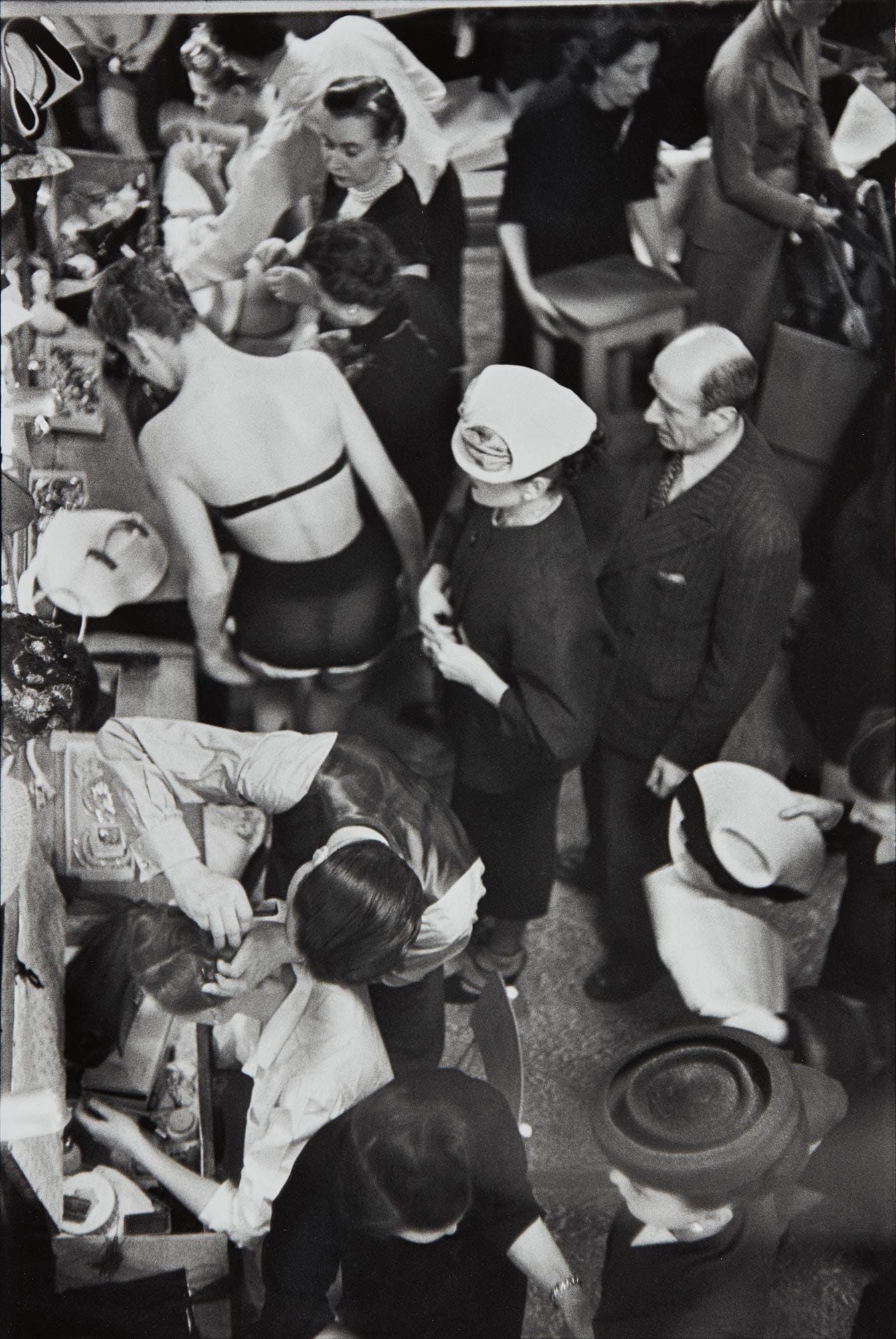 <b>HENRI CARTIER-BRESSON </b><i>Changing during the Christian Dior fashion show, Paris</i>, circa 1947