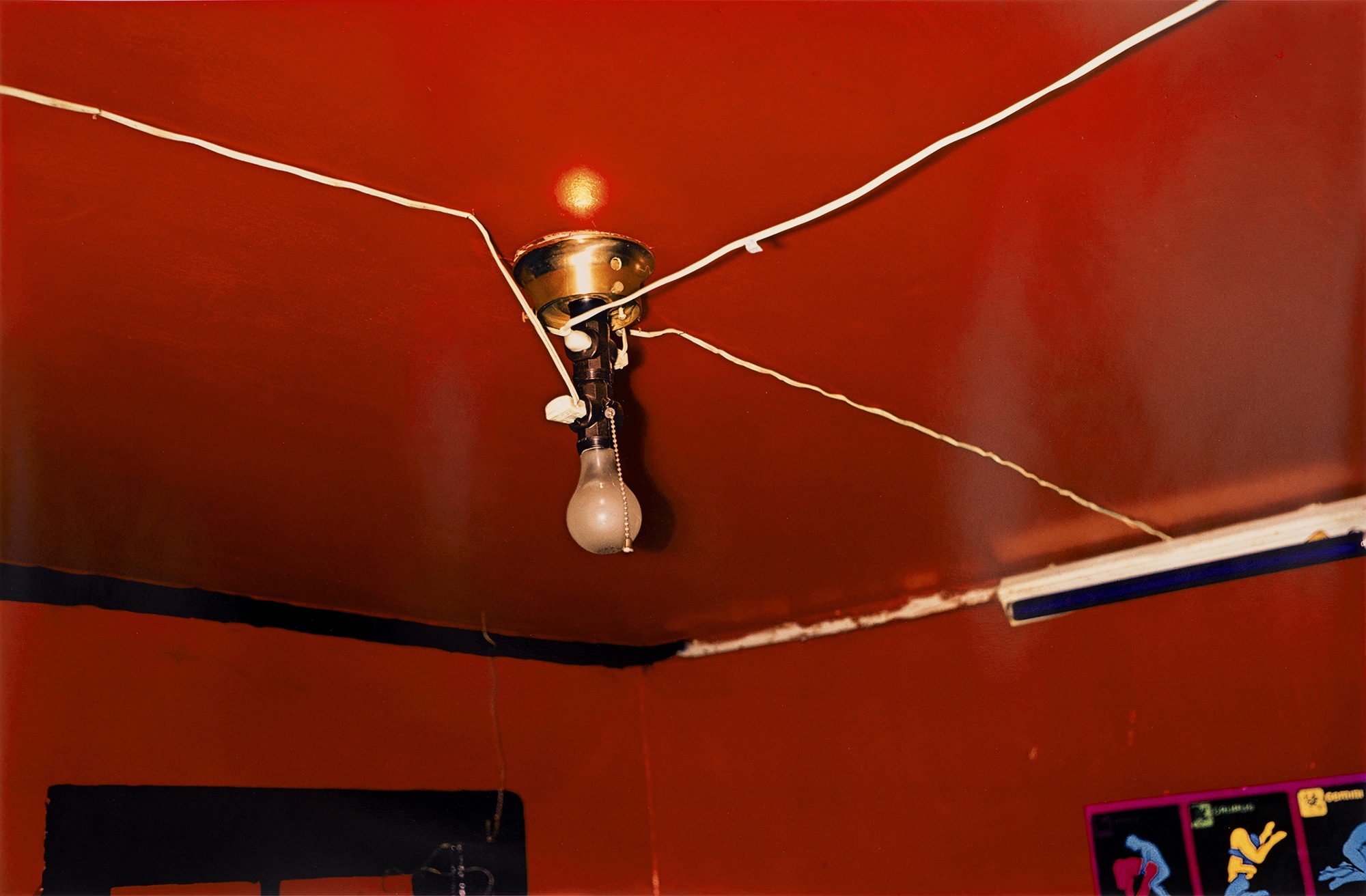 <p><strong>WILLIAM EGGLESTON</strong> <em>Greenwood, Mississippi (red ceiling)</em>, 1973</p>