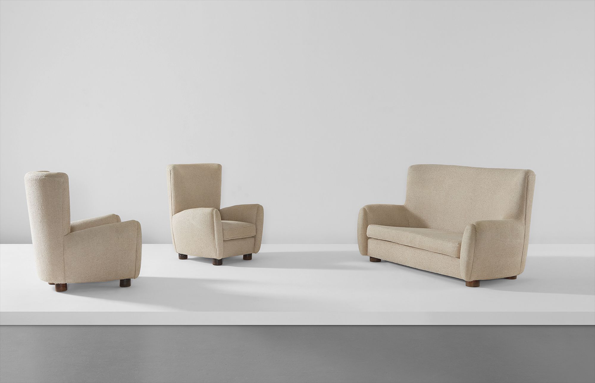 <b>JEAN ROY&#200;RE</b> <i>'Relax' sofa and pair of armchairs</i>, circa 1950