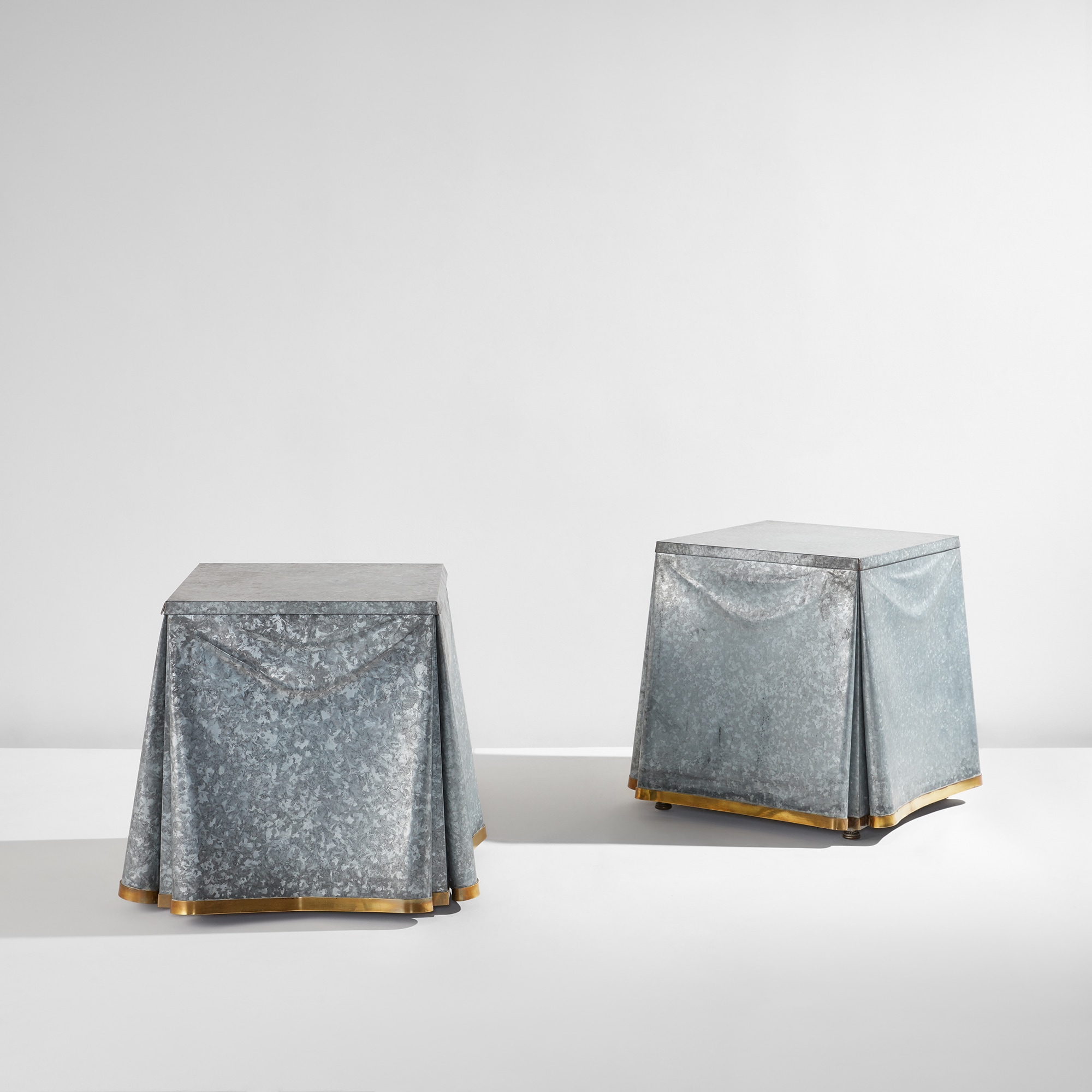 <p><strong>JOHN DICKINSON</strong><em> Pair of "Drape" tables</em>, circa 1972</p>