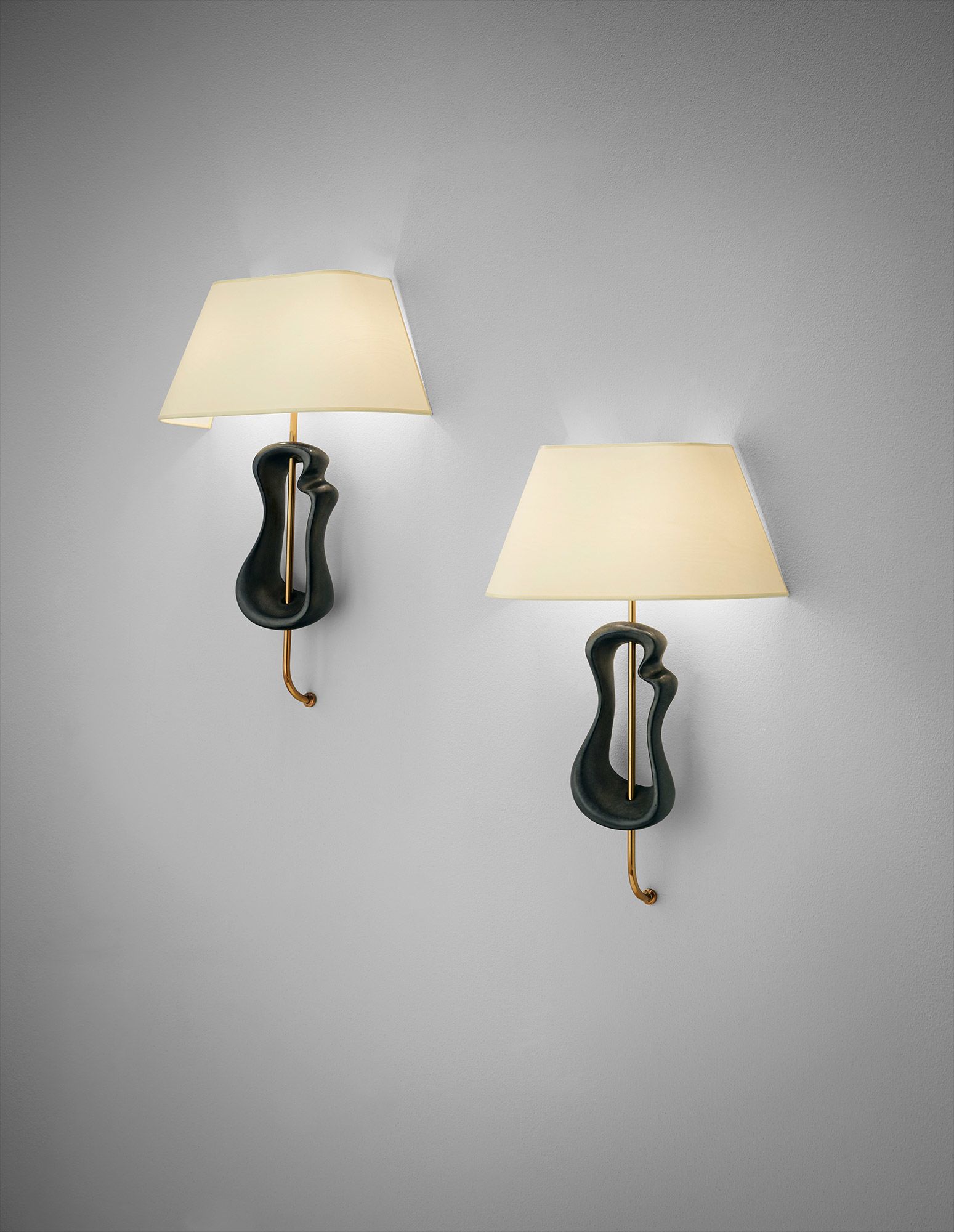 <b>GEORGES JOUVE</b> <i>Pair of 'Lyre' wall lights,</i> 1950s