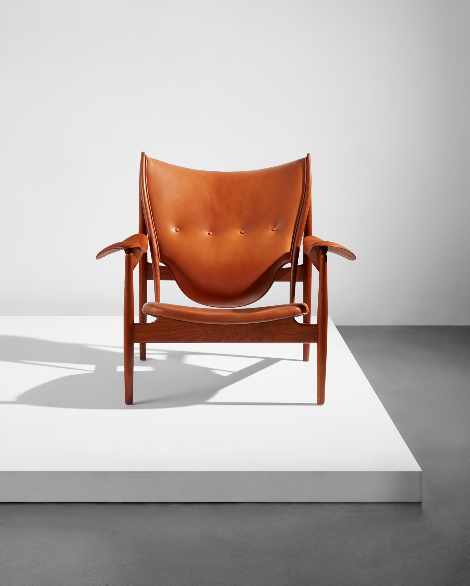 <p><strong>FINN JUHL</strong><em> “Chieftain” chair, model no. FJ 49 A</em>, circa 1955</p>