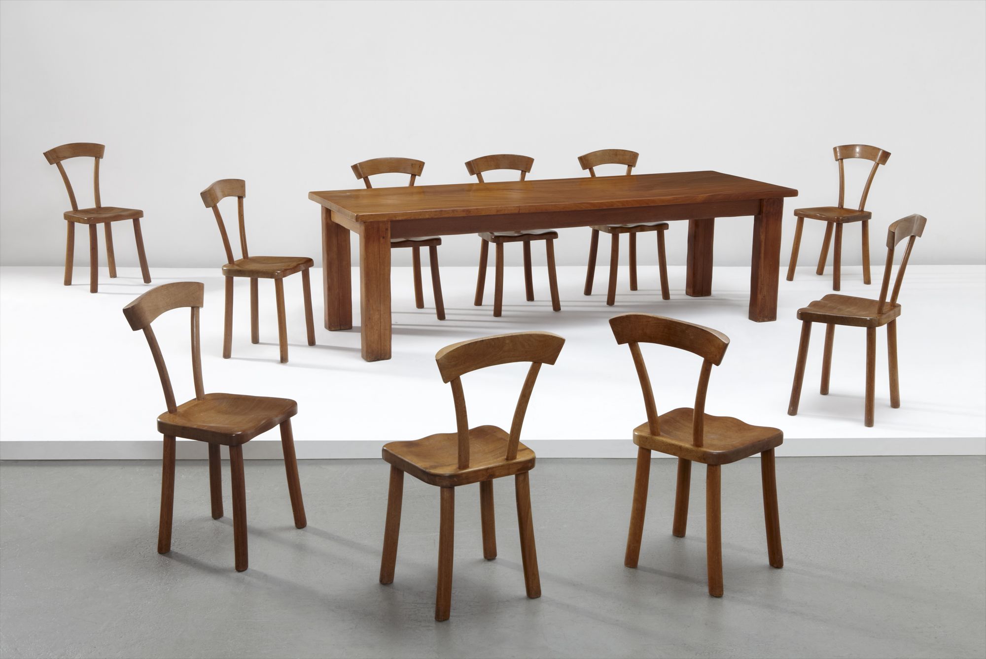 <b>ALEXANDRE NOLL</b> <i>Important dining table and set of ten chairs</i>, circa 1945