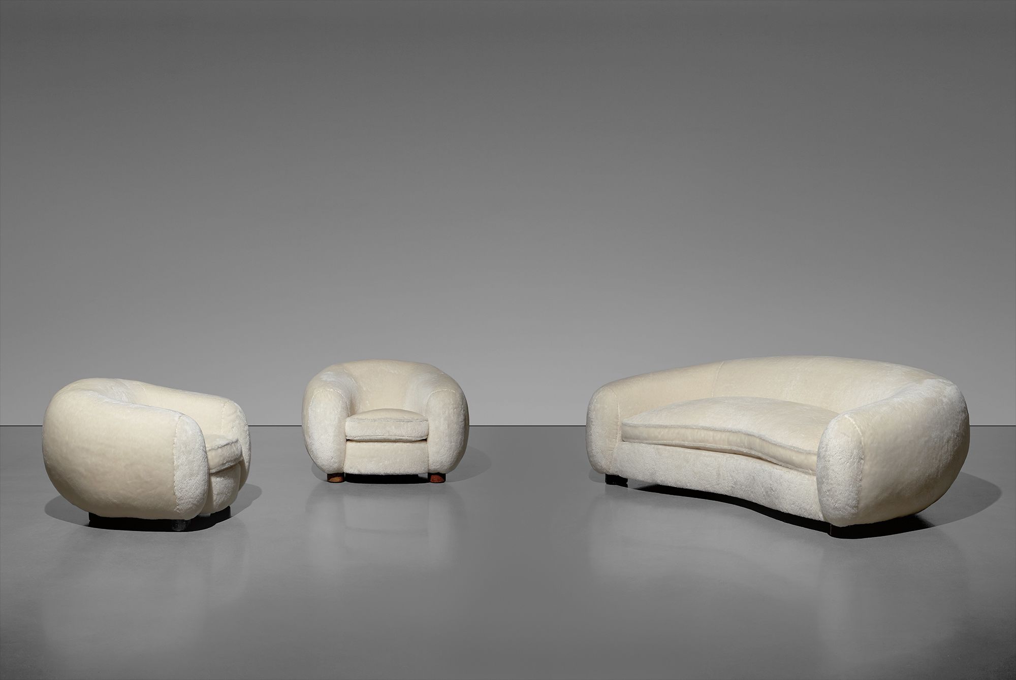 <b>JEAN ROYÈRE</b> 'Ours Polaire' sofa and pair of armchairs, 1950s
