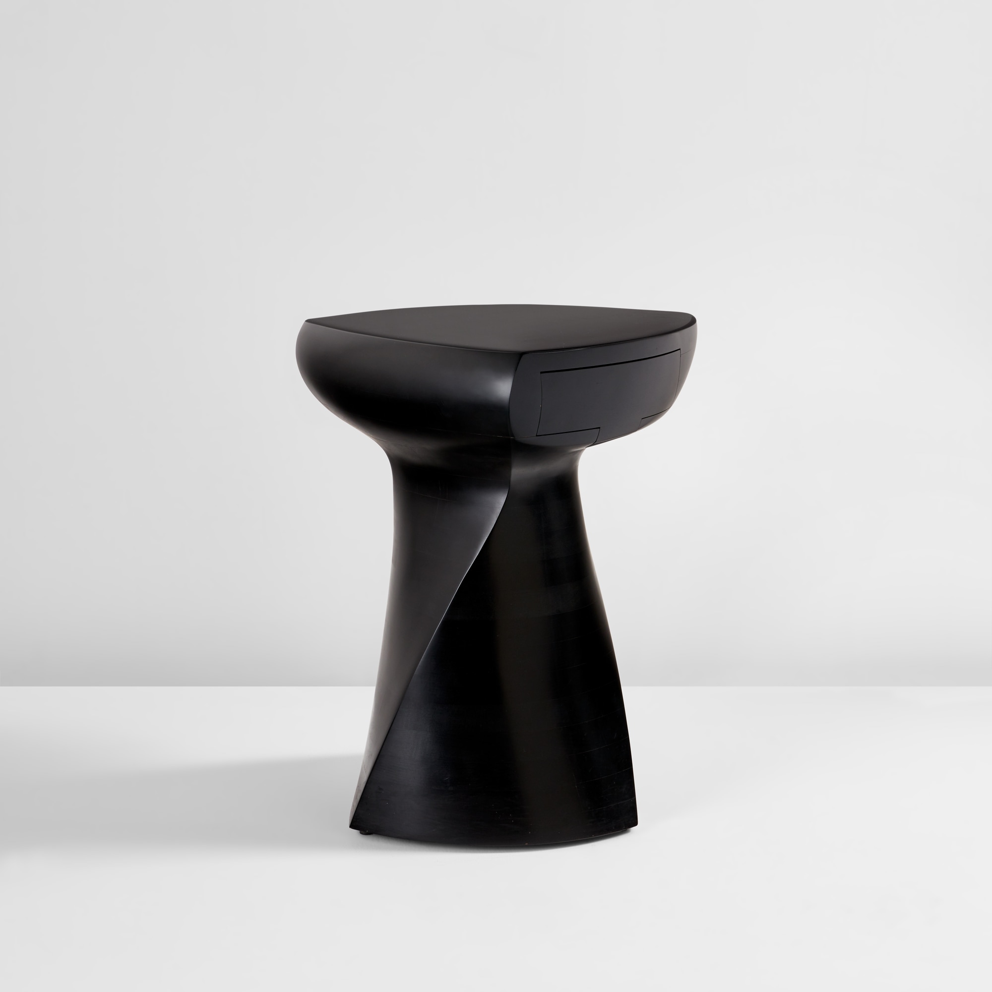 <p><strong>WENDELL CASTLE </strong><em>side table</em>, 1980</p>