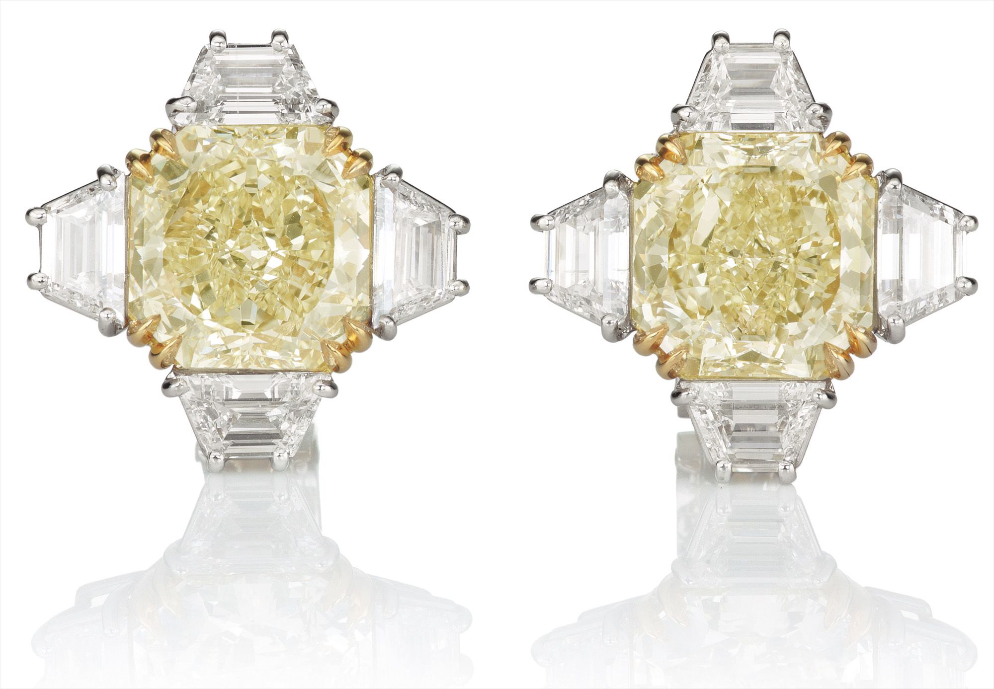 <i>An Important Pair of Fancy Yellow Diamond and Diamond Earclips</i>