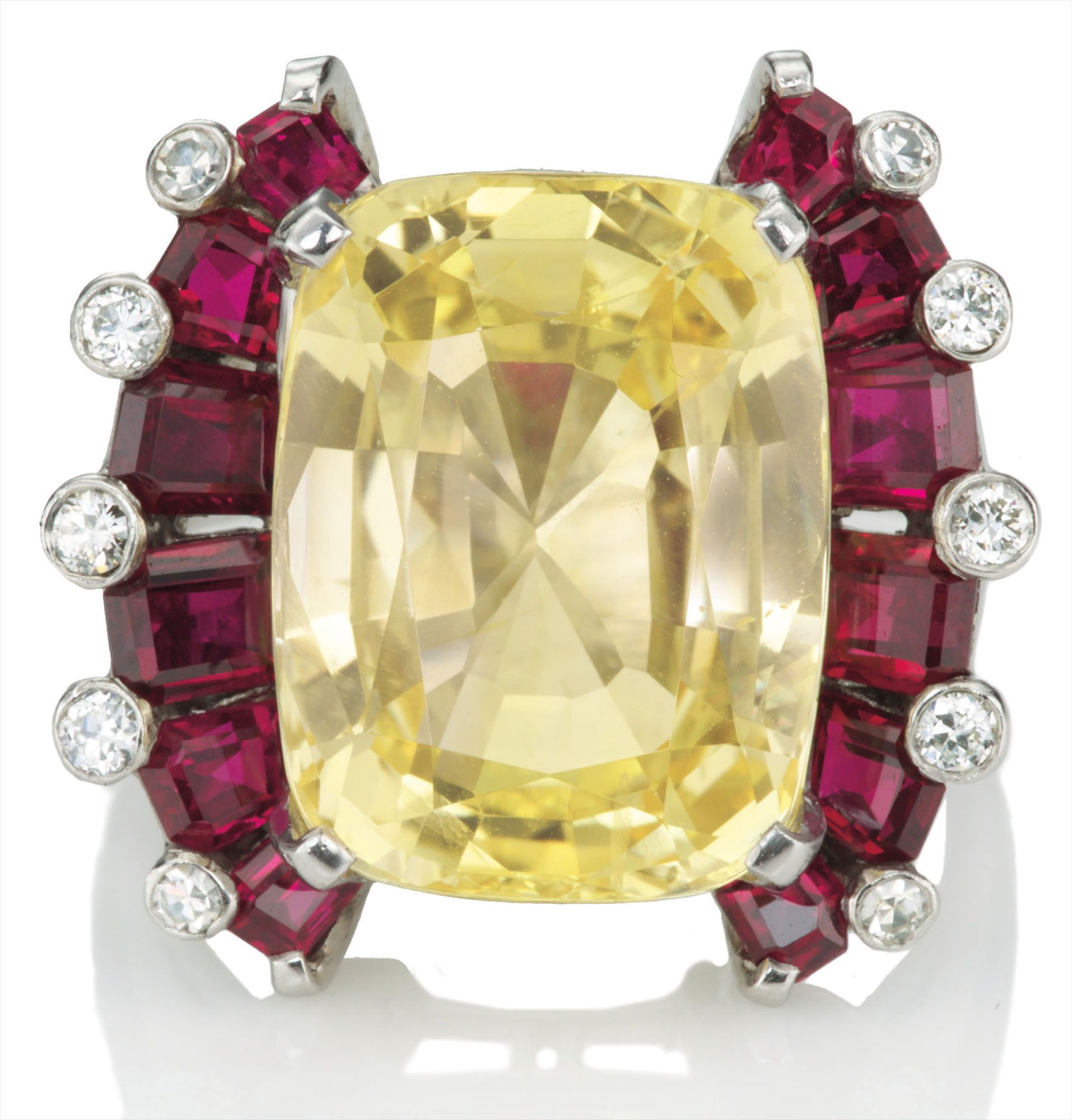 <b>OSCAR HEYMAN</b> <i>A Yellow Sapphire, Ruby, and Diamond Ring </i>