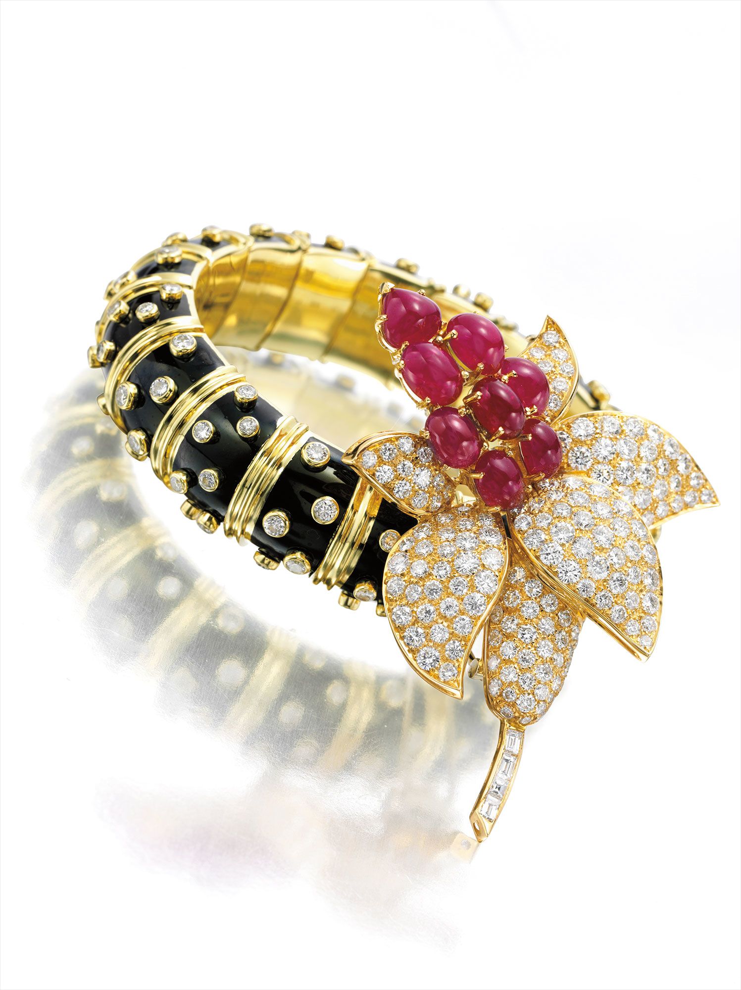 <b>SCHLUMBERGER FOR TIFFANY & CO. </b><i>A Diamond, Gold and 'Pailloné' Enamel Bangle Bracelet </i>and<i> A Diamond and Ruby Brooch </i>