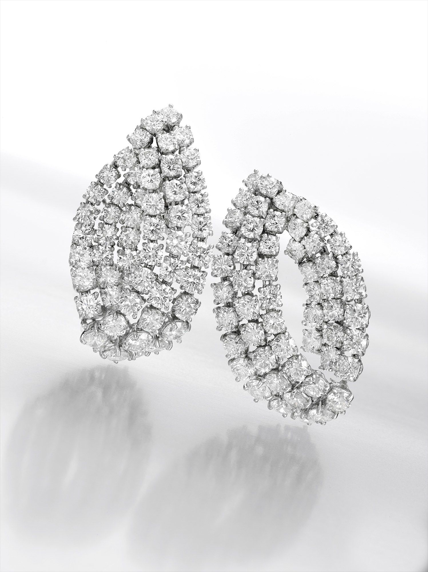 <b>HARRY WINSTON </b><i>A Superb Pair of Diamond Earclips</i>