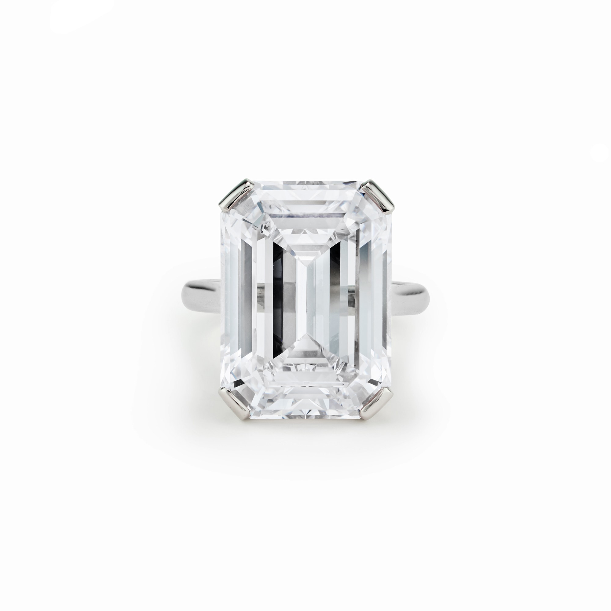 <p>An Emerald Cut Diamond and Platinum Ring</p>