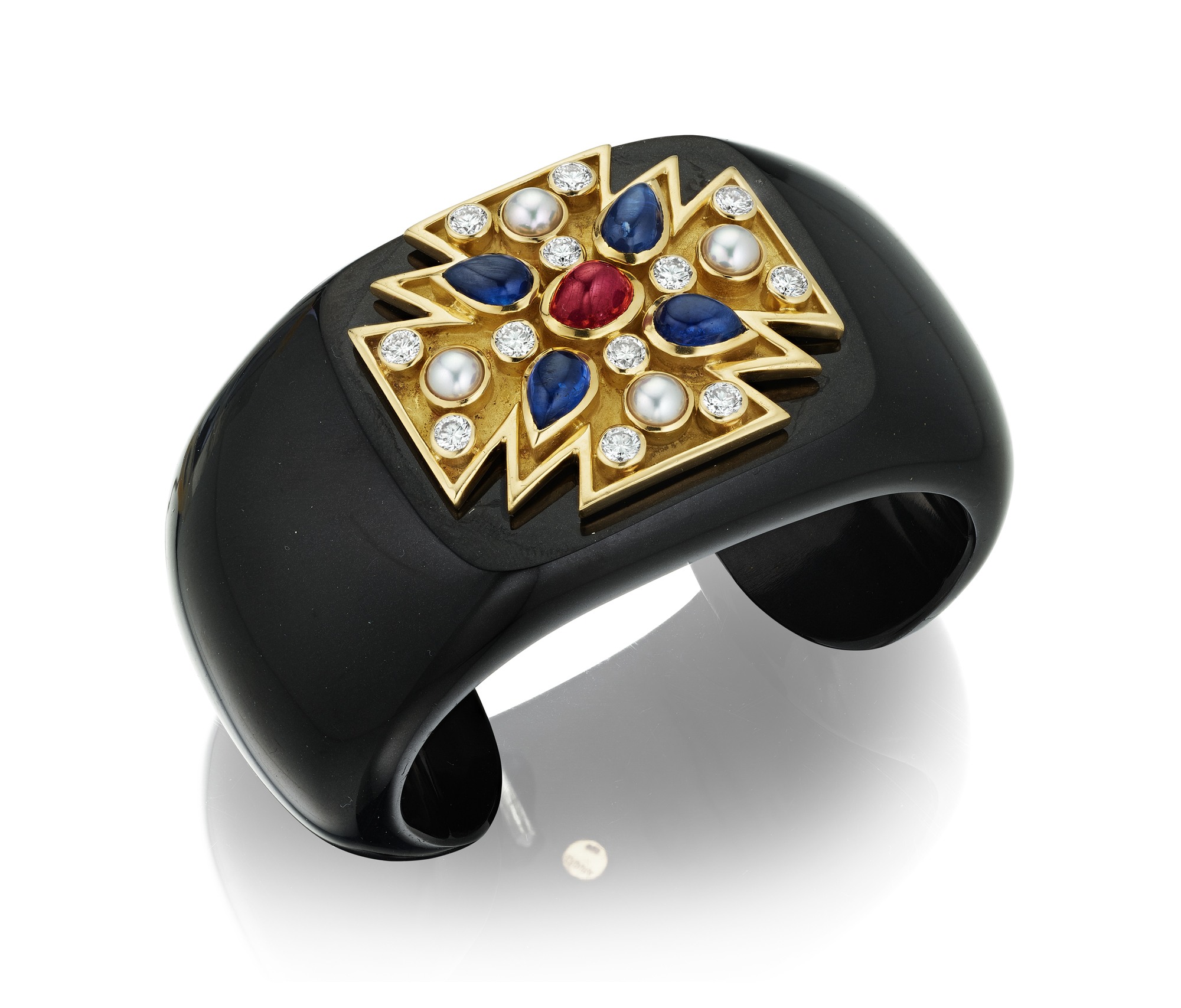 <p><strong>VERDURA</strong> <em>Black Jade, Gem-Set, and Diamond Cuff, 'Maltese Cross'</em></p>