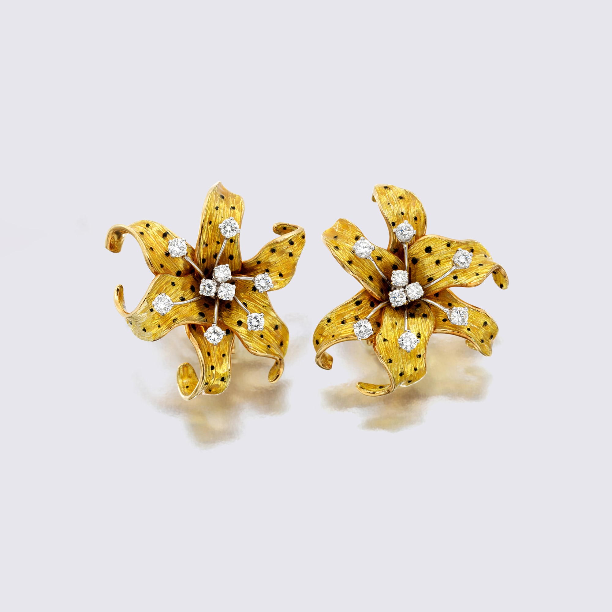 <p><strong>DAVID WEBB</strong> <em>Enamel and Diamond Earclips</em></p>