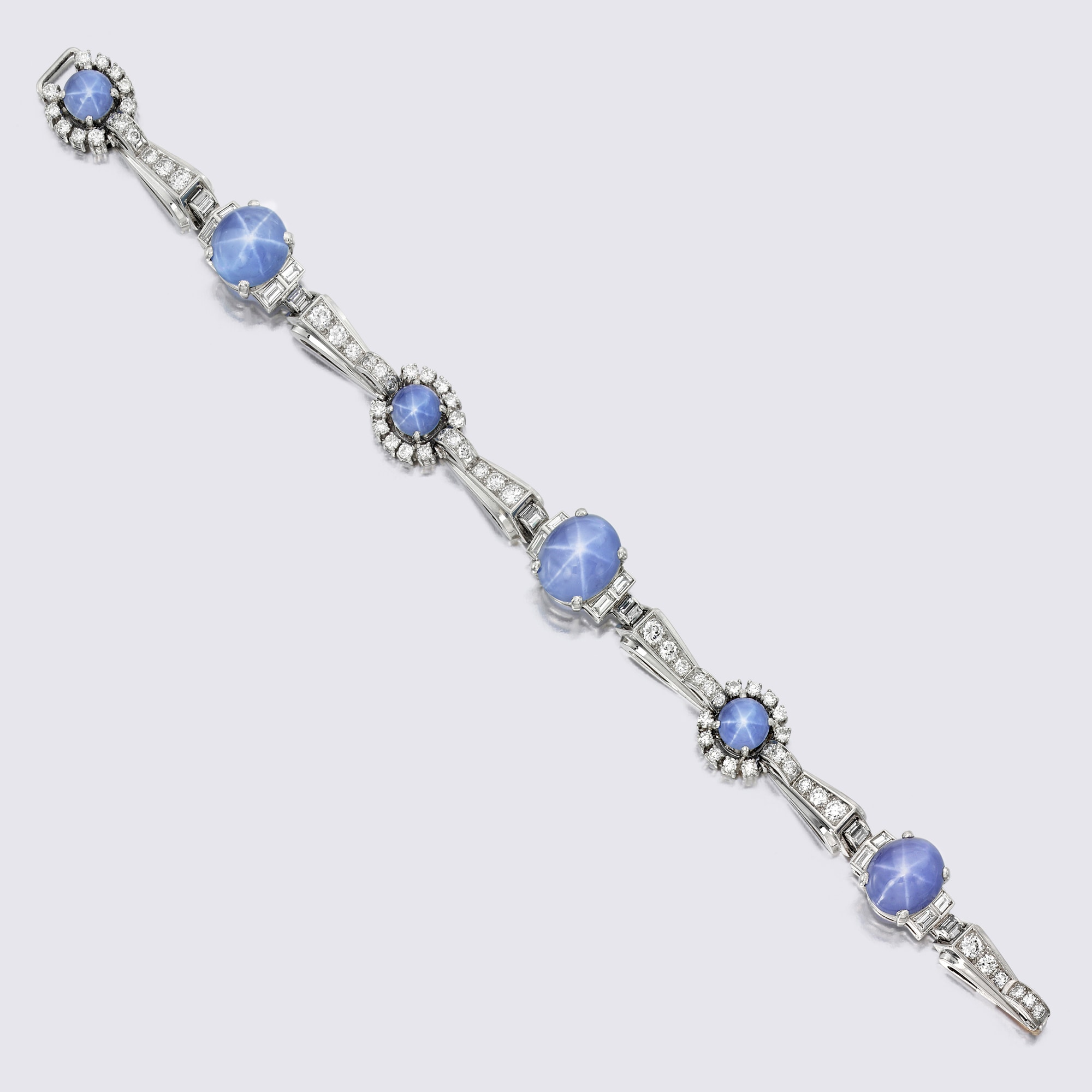 <p><strong>OSCAR HEYMAN & BROTHERS</strong> <em>Star Sapphire and Diamond Bracelet</em></p>