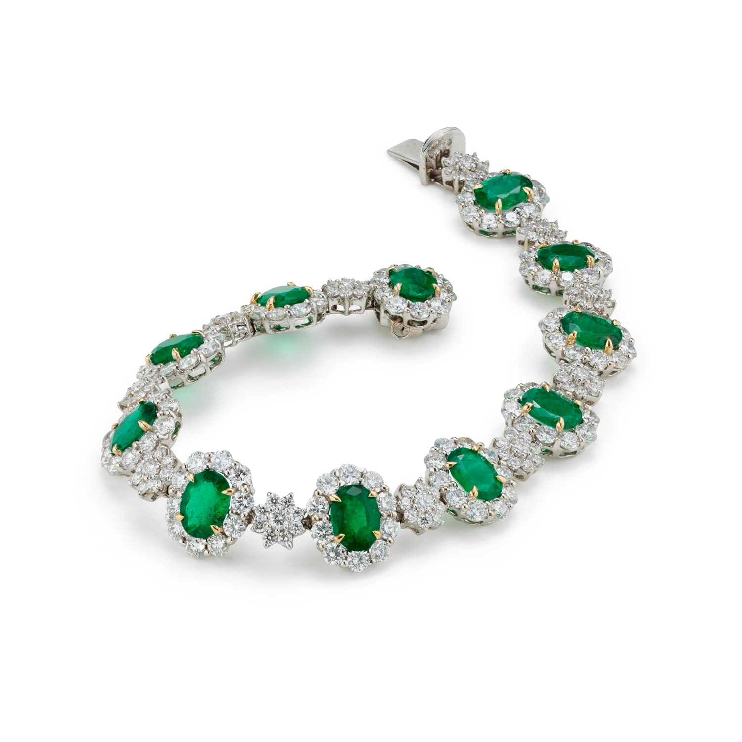 <p>An Emerald, Diamond and Gold Bracelet </p>