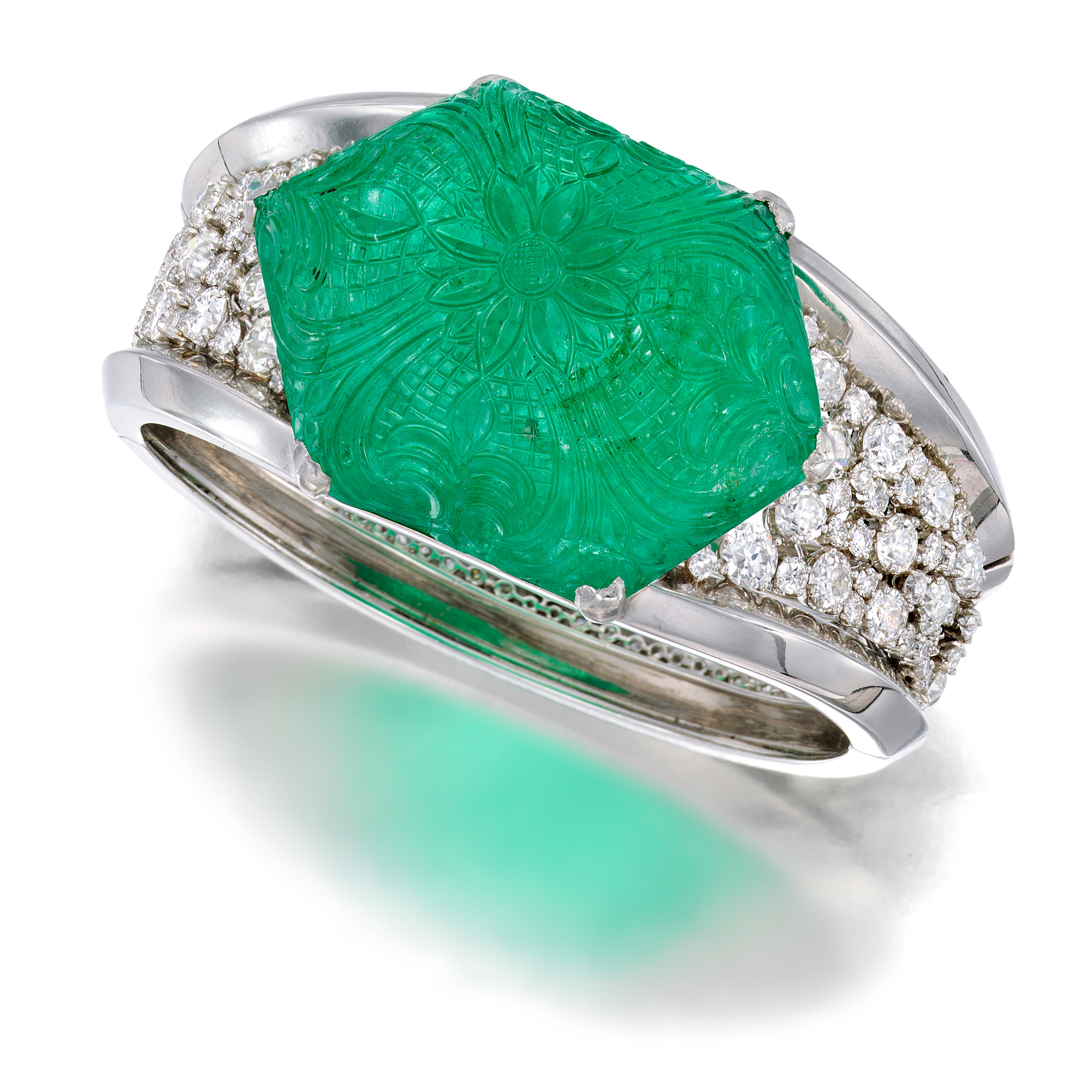 <p><strong>PAUL FLATO</strong> <em>A Carved Emerald, Diamond and Platinum Bracelet</em></p>