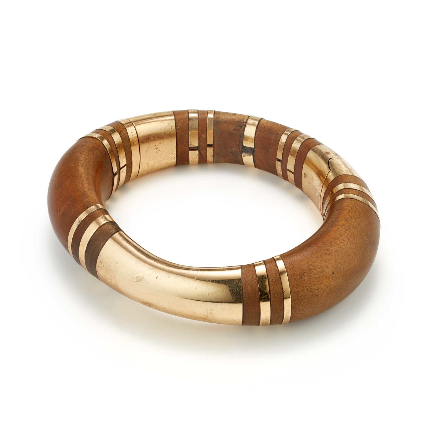 <p><strong>RENE BOIVIN</strong>. A Wood and Gold Bracelet </p>
