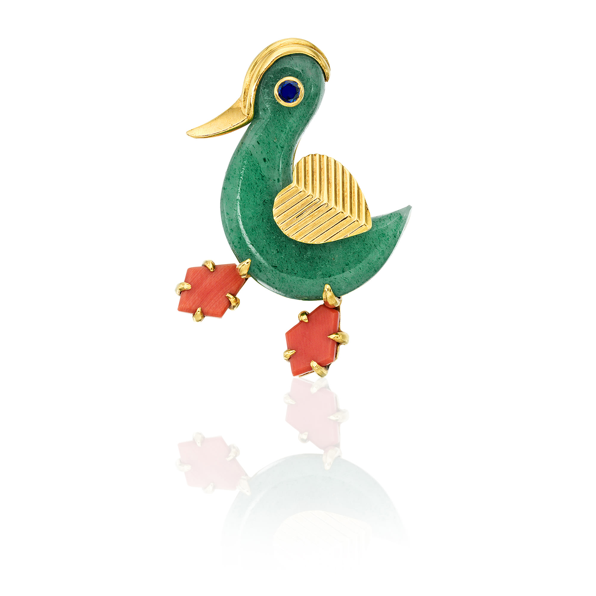 <p><strong>CARTIER.</strong> A Nephrite, Coral, Sapphire and Gold Duck Brooch</p>