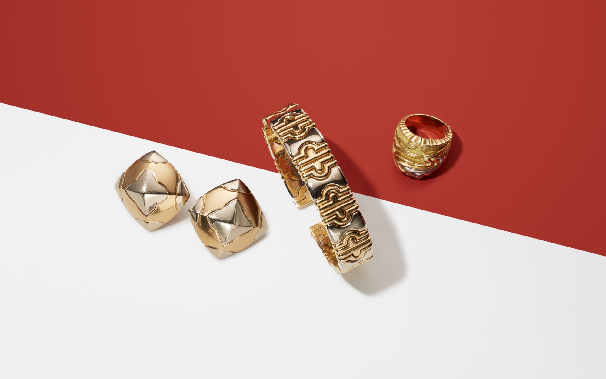 <p><strong>BULGARI</strong>. A Pair of Gold &lsquo;Pyramid&rsquo; Earrings; A Gold Bracelet; <strong>HENRY DUNAY</strong>. A Platinum and Gold &lsquo;Cinnabar&rsquo; Ring;&nbsp;<strong>BULGARI.</strong> A Pair of Gold &lsquo;Pyramid&rsquo; Earrings A Gold Bracelet; <strong>HENRY DUNAY</strong>. &nbsp;A Platinum and Gold &lsquo;Cinnabar&rsquo; Ring&nbsp;</p>
