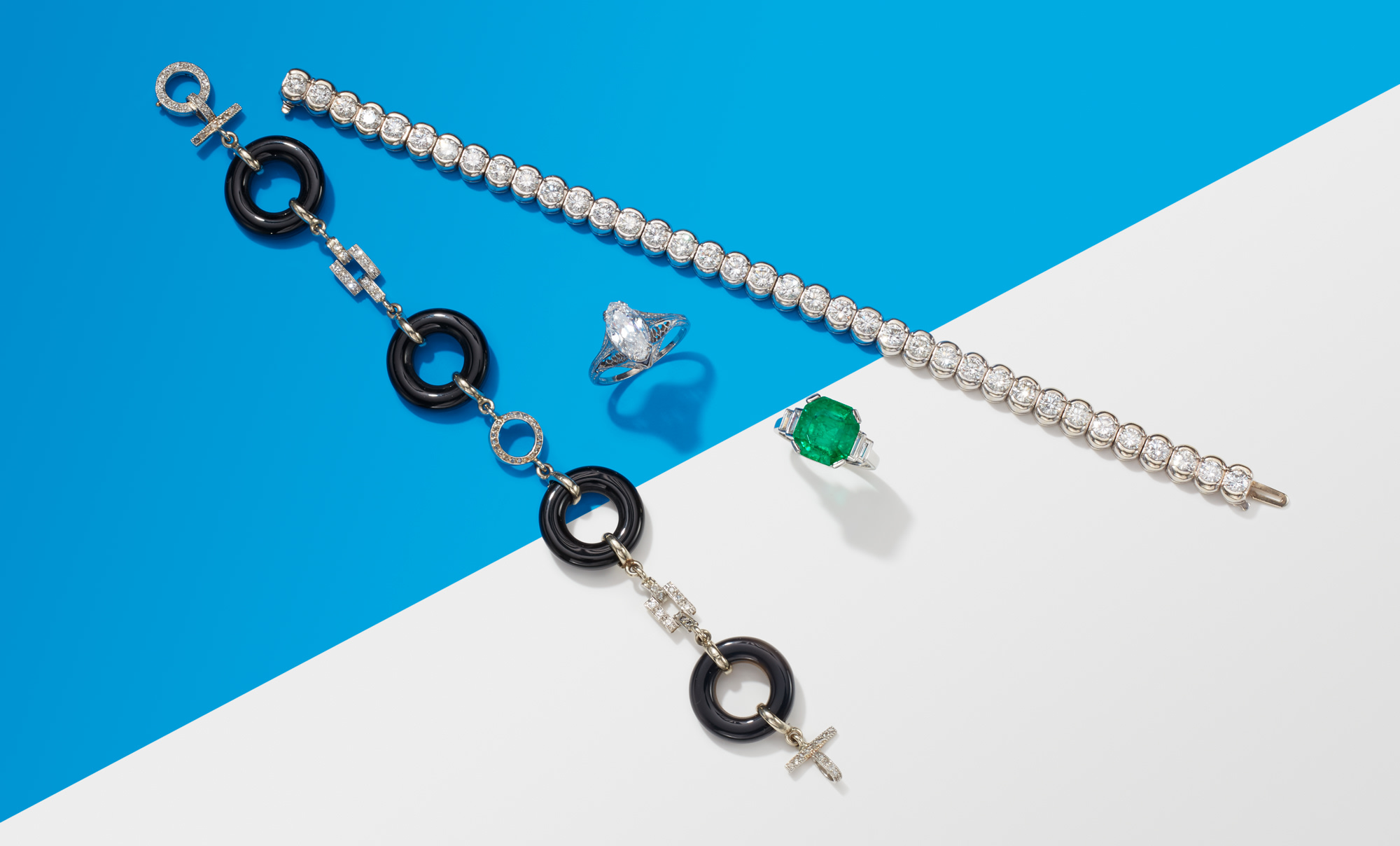 <p>&nbsp;<strong>MAUBOUSSIN</strong>. An Art Deco Emerald, Diamond and Platinum Ring; An Art Deco Diamond and Platinum Ring; A Diamond, Onyx and Platinum Bracelet; A Diamond and Gold Bracelet &nbsp;</p>
