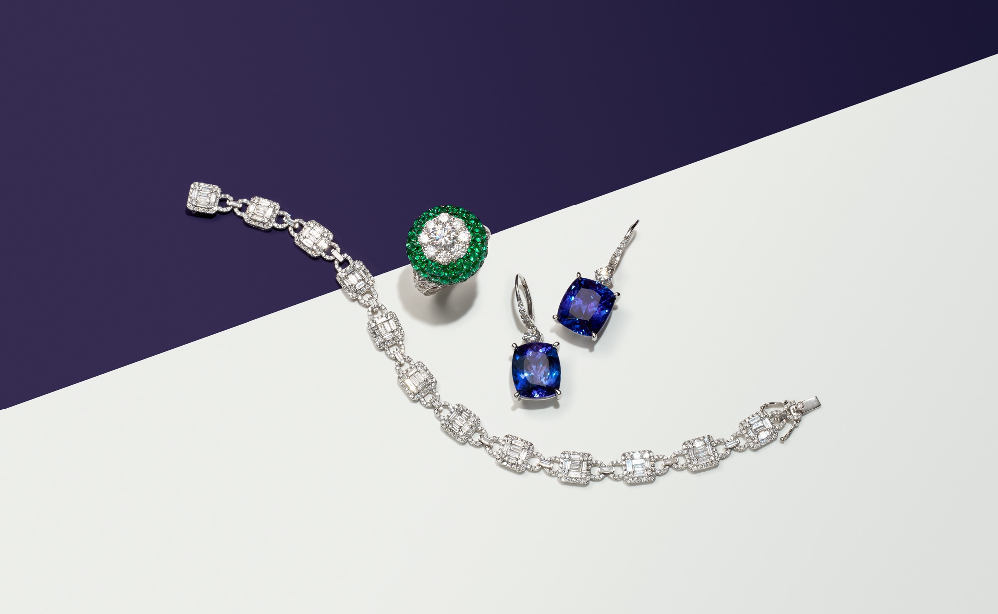 <p><strong>GRAFF</strong>. A Diamond, Emerald and Gold &lsquo;Halo&rsquo; Ring; A Diamond and Gold Bracelet; A Pair of Tanzanite, Diamond and Gold Earrings &nbsp;</p>
