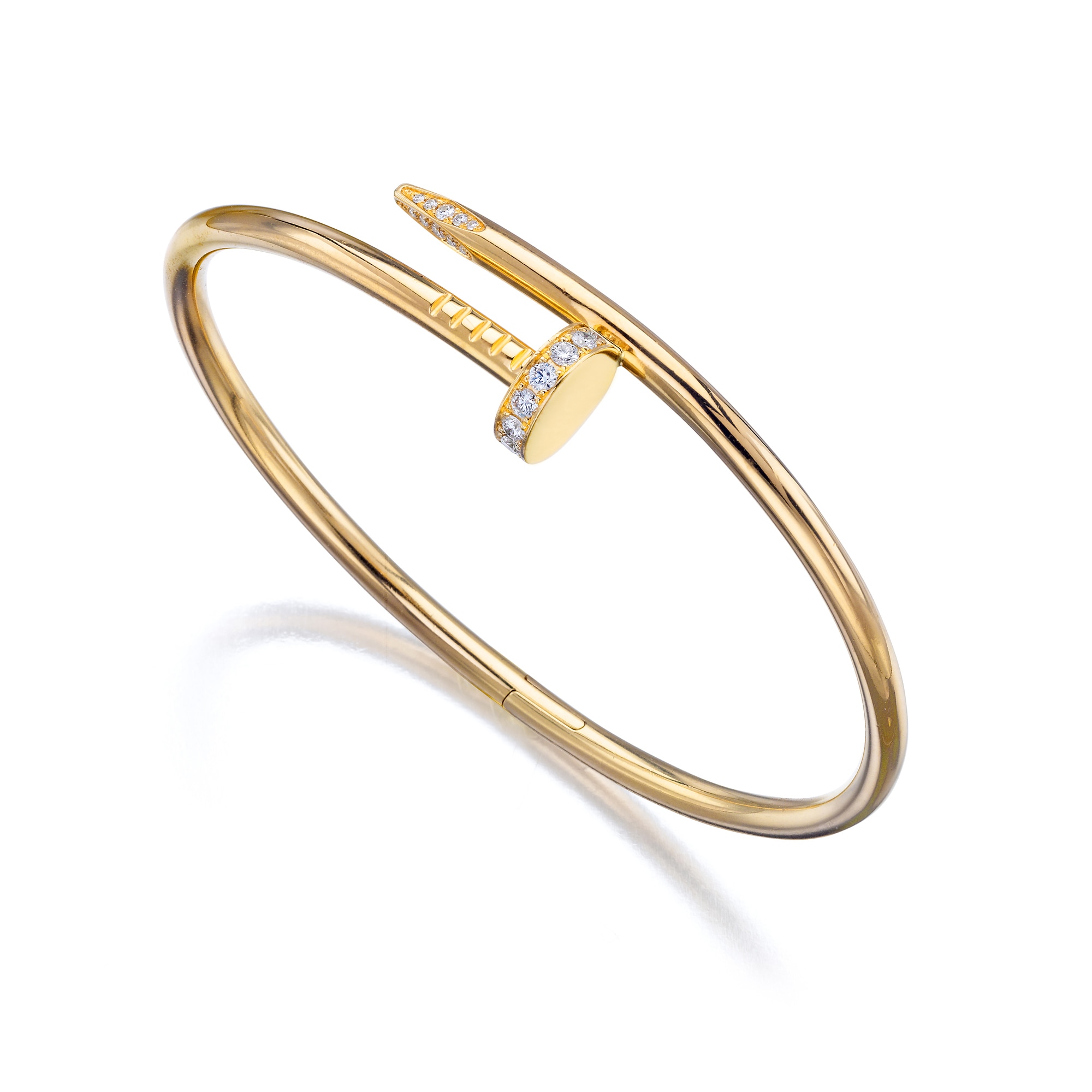 <p><strong>CARTIER</strong> <em>A Diamond and Gold 'Juste Un Clou' Bracelet</em></p>