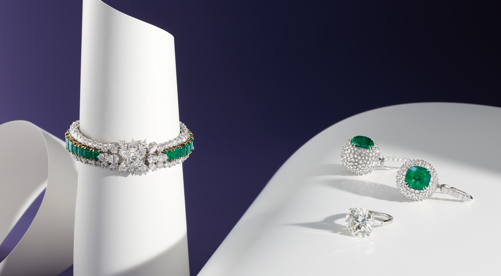 <p><strong>HARRY WINSTON</strong>. An Important Diamond and Emerald Bracelet, Circa 1967; &nbsp;A Diamond Ring;&nbsp;&nbsp;A Pair of Emerald and Diamond &lsquo;Hedgehog&rsquo; Earrings &nbsp;</p>
