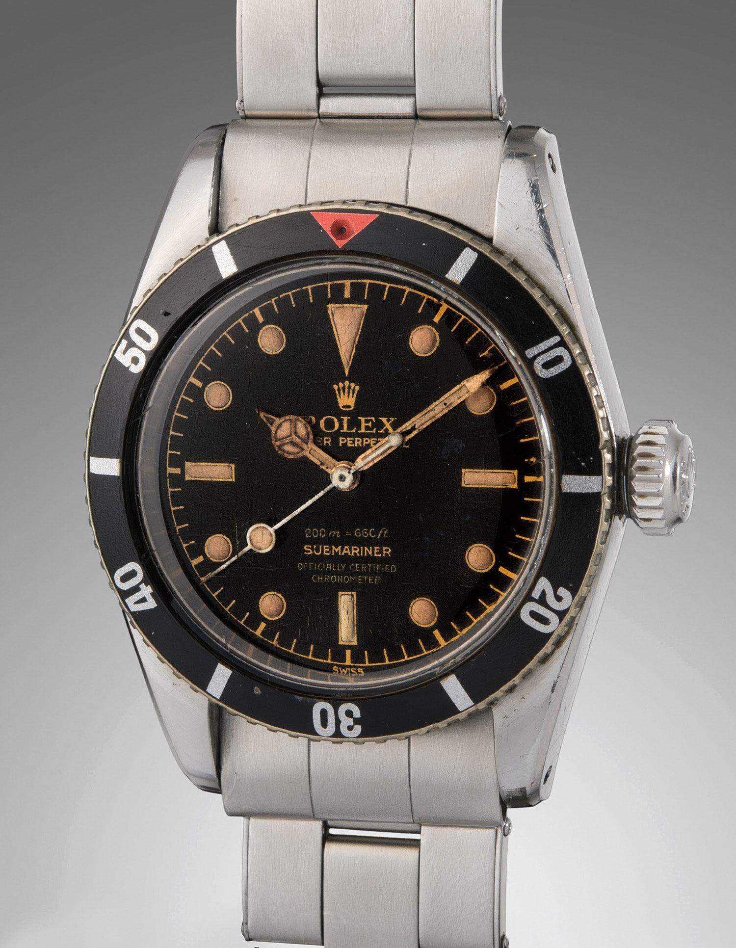 <b>ROLEX </b>'Big Crown' Submariner, Reference 6538. An extremely rare stainless steel wristwatch with 'four liner' glossy dial, original box, guarantee and chronometer certificate, circa 1957