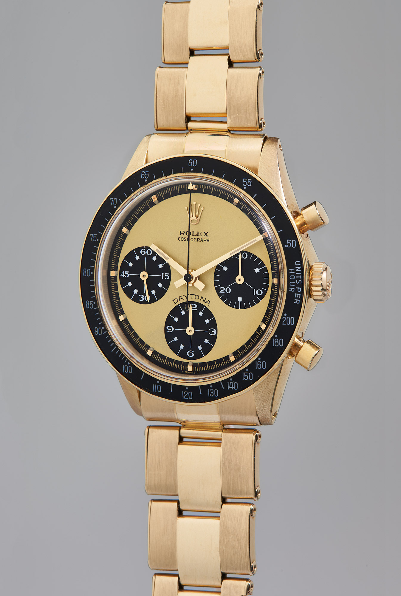 <p>Rolex Cosmograph Daytona 'Paul Newman Lemon', Reference 6264. An extremely rare, highly attractive, and important yellow gold chronograph wristwatch with 'Paul Newman Lemon' dial, circa 1969</p>