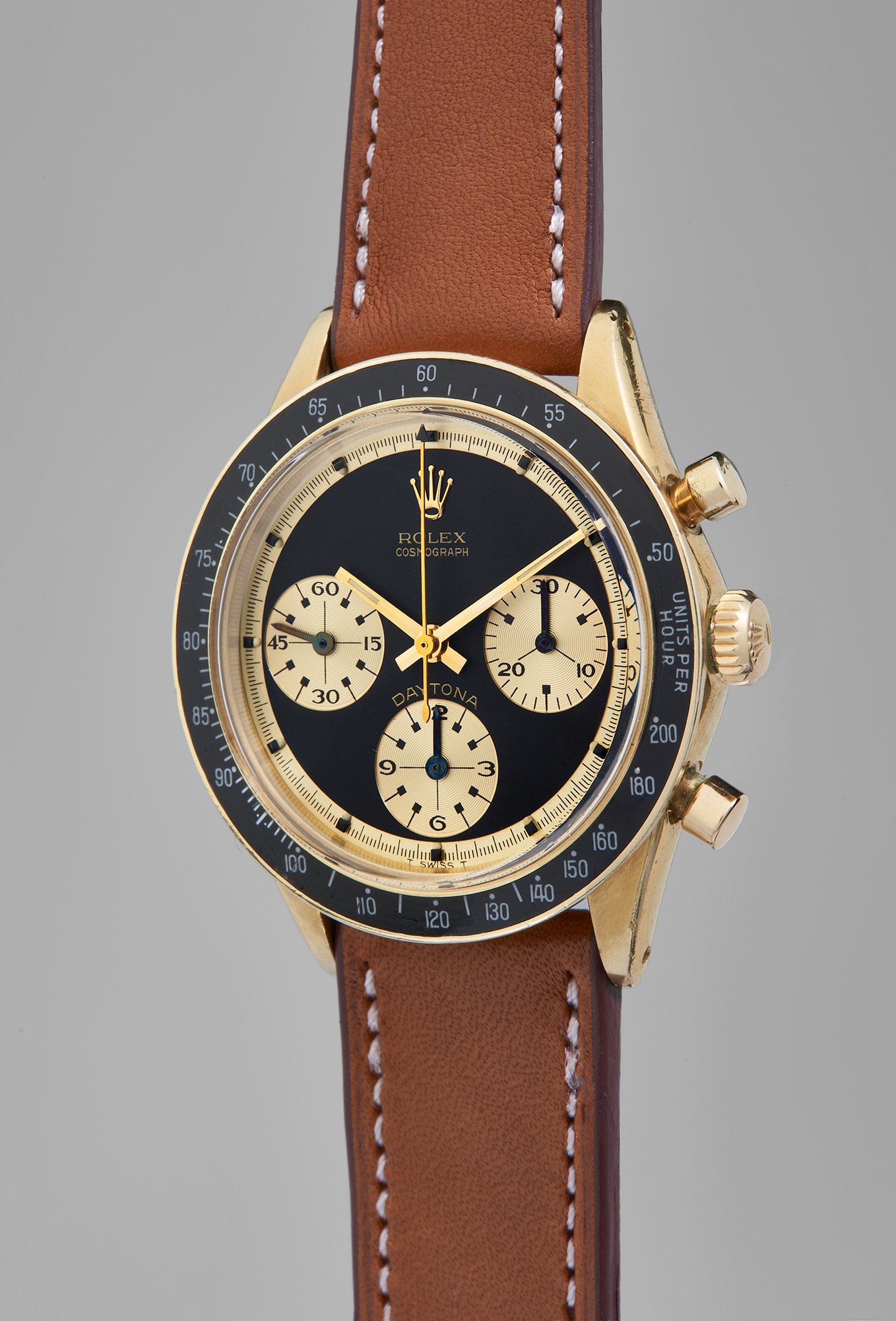 <p>Rolex Cosmograph Daytona 'Paul Newman John Player Special', Reference 6241. A previously unknown, well-preserved, and highly attractive yellow gold chronograph wristwatch with 'Paul Newman' dial and original guarantee, circa 1968</p>