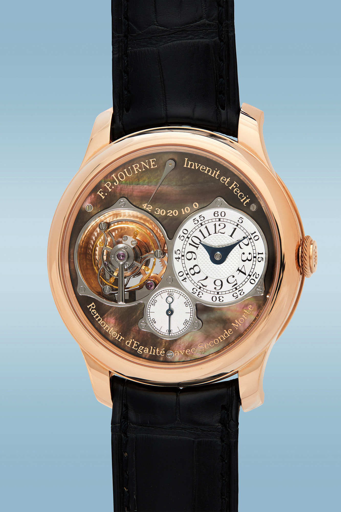 <p><strong>F.P. Journe. </strong>An extremely rare and beautiful limited edition &lsquo;Souverain&rsquo; pink gold tourbillon wristwatch with black mother-of-pearl dial, constant force remontoire, power reserve, and dead beat seconds, circa 2005. Estimate: $150,000 - $300,000</p>
