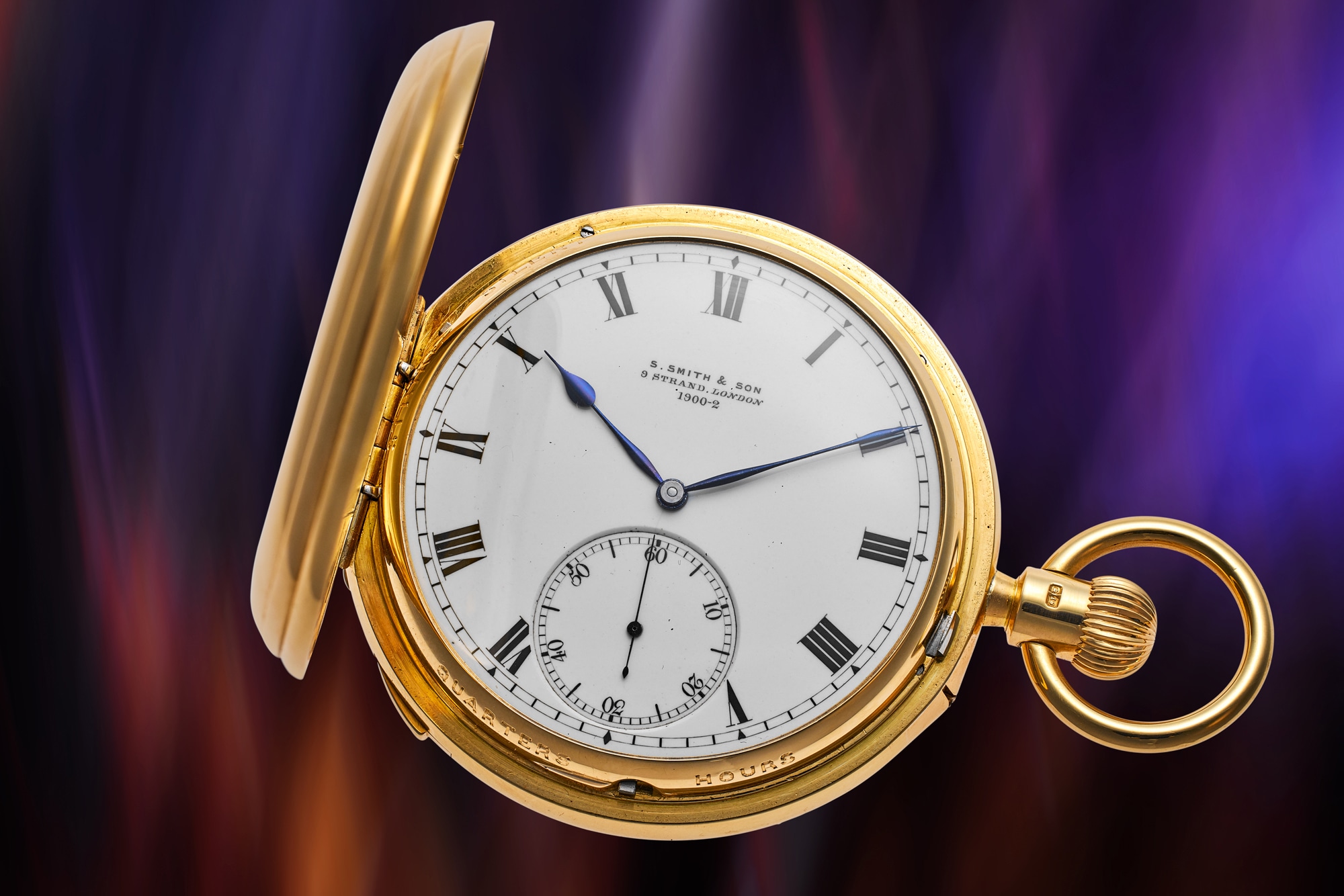 <p><strong>S. SMITH & SON</strong> <em>A yellow gold hunter-cased grande and petite sonnerie minute repeating clock watch with tourbillon</em>, circa 1899</p>