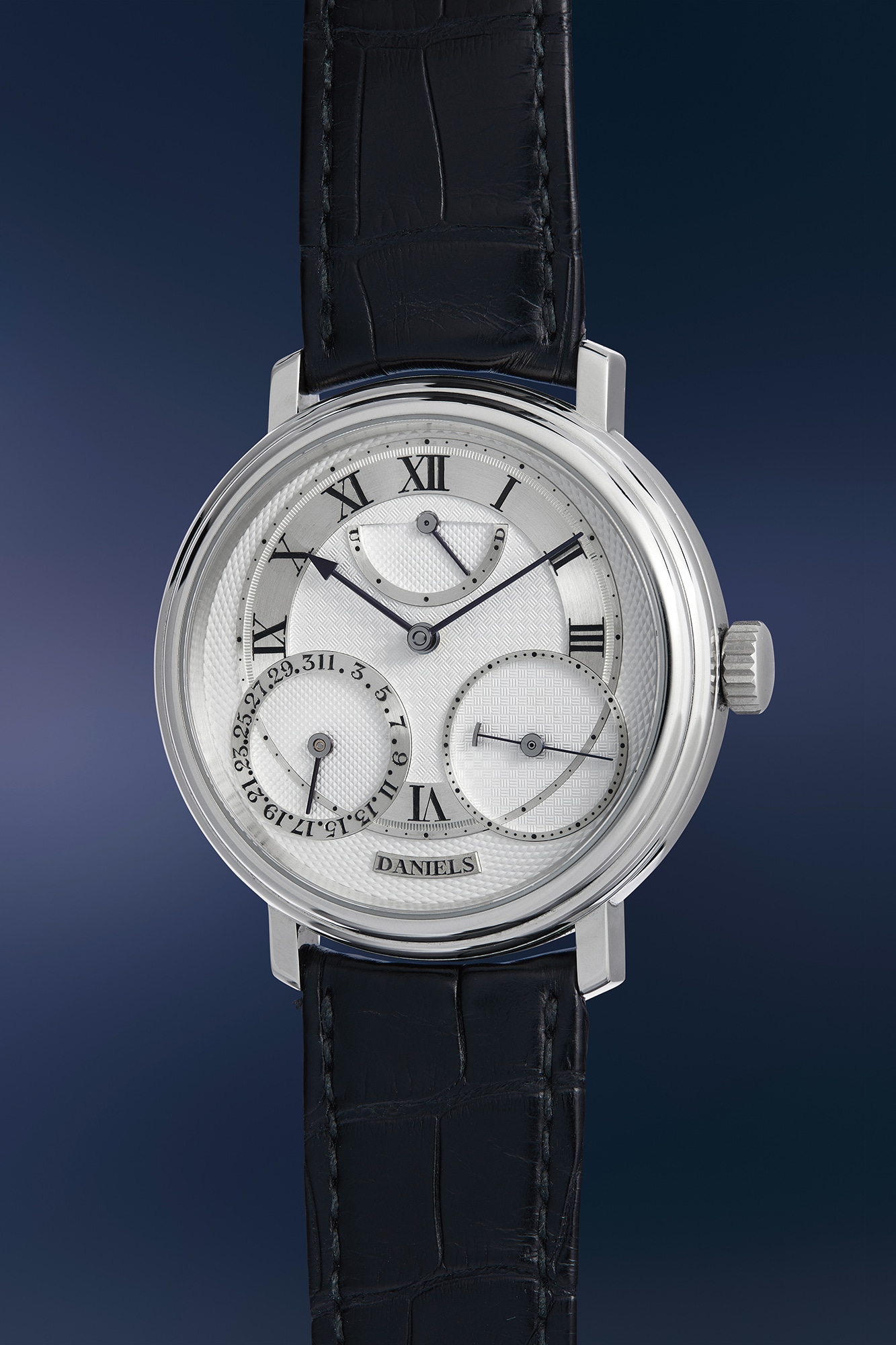 <p><strong>GEORGE DANIELS</strong> The George Daniels Anniversary Watch, No. 00 - An extremely rare, spectacular, and historically important platinum co-axial limited edition wristwatch with date and power reserve indication, with guarantee, signed George Daniels letter, and presentation box, bearing serial number “00”, with a portion of the proceeds to benefit The George Daniels Educational Trust, The Alliance of British Watch and Clock Makers, and The Horological Society of New York</p>