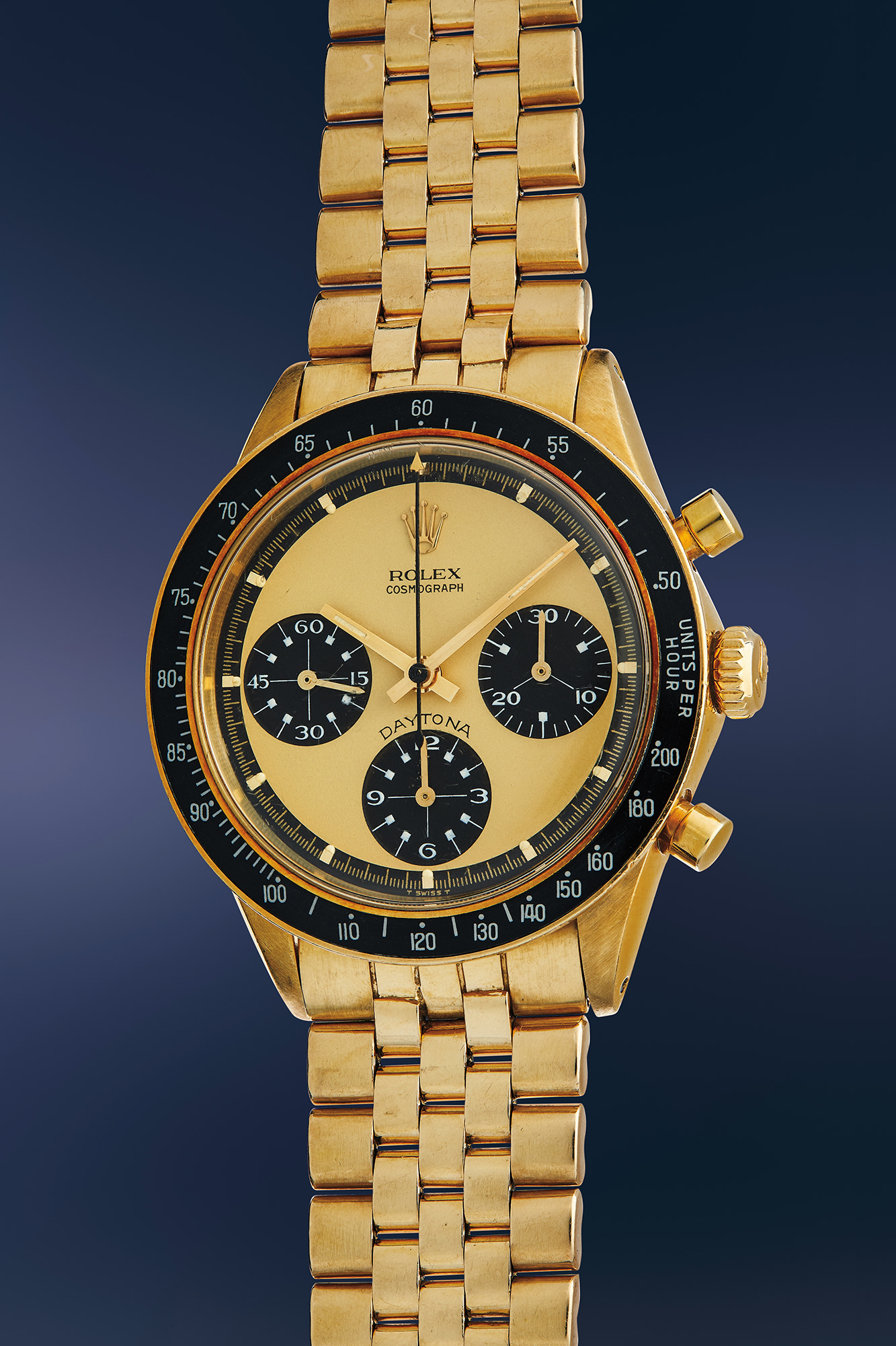 <p><strong>ROLEX </strong>An exceptionally well-preserved, and extremely rare yellow gold chronograph wristwatch with ‘Paul Newman Lemon’ exotic dial, white subdial graphics, and bracelet, offered by the family of the original owner</p>