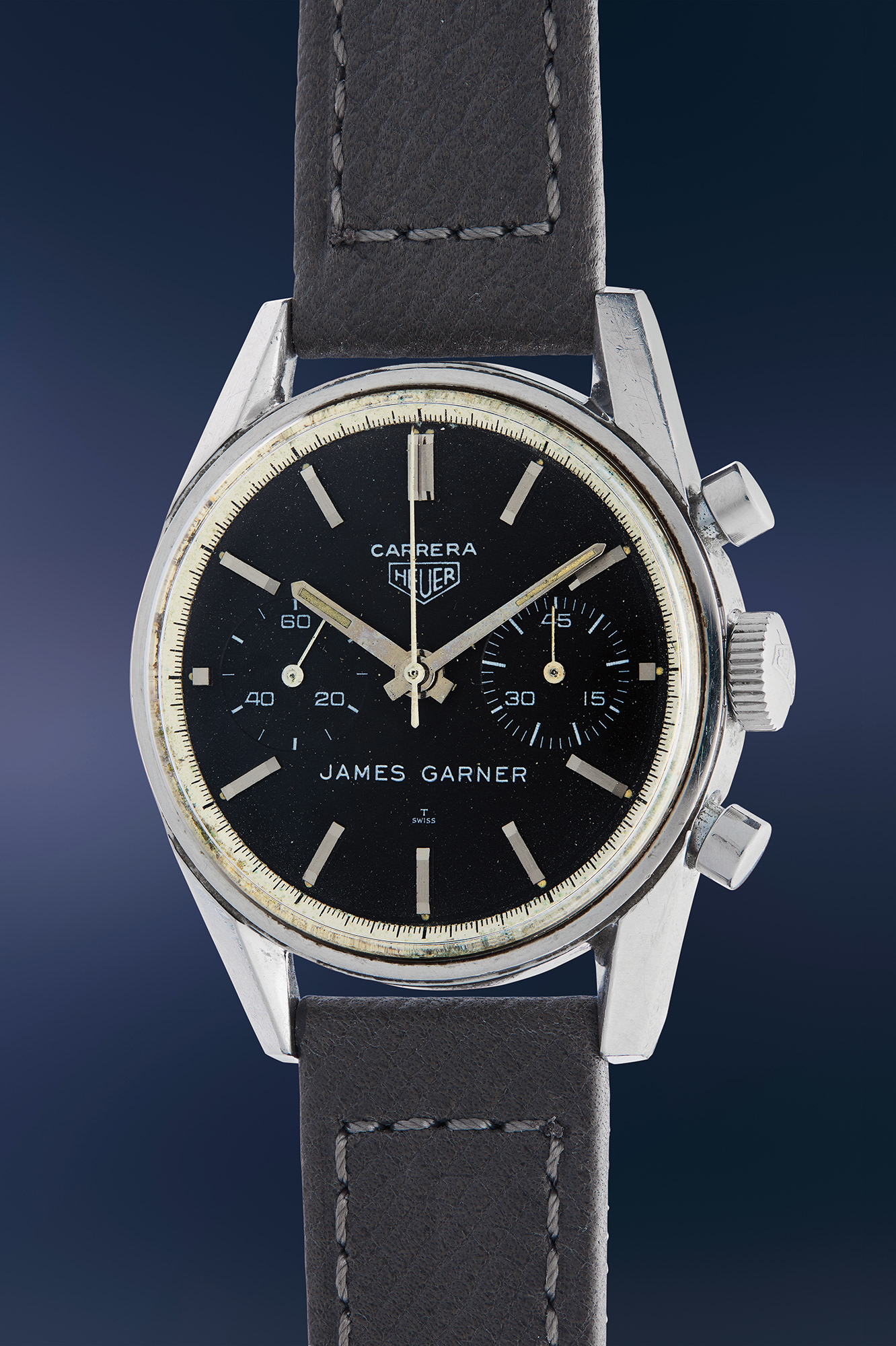 <p><strong>HEUER</strong> The James Garner Heuer, ref. 3647 - A unique, culturally significant, and historically important stainless steel chronograph wristwatch with black dial and personalized dial printing, formerly owned and worn by James Garner, with a portion of the proceeds benefitting the James Garner Animal Rescue Fund</p>